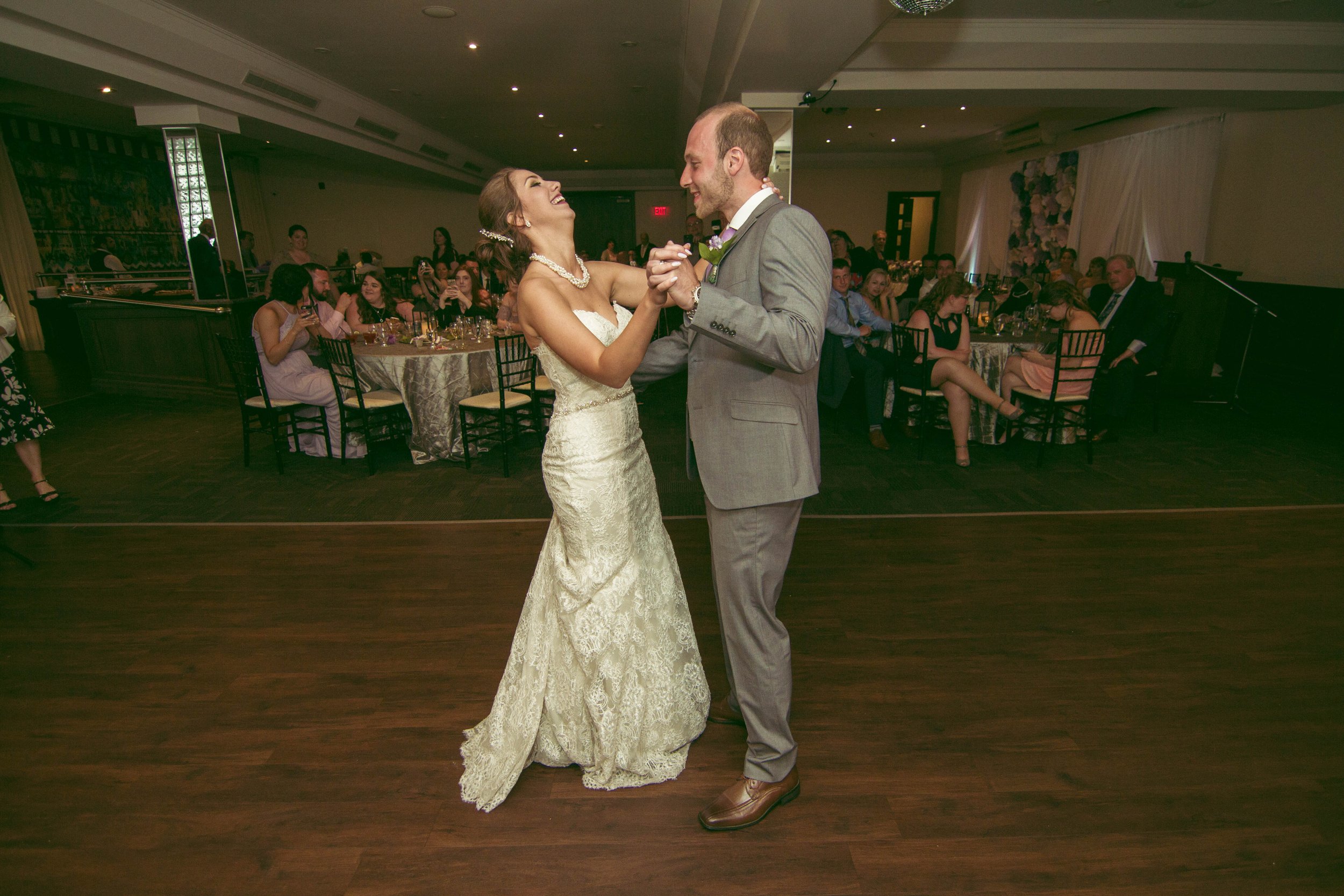 Bride and groom in love during their beautiful outdoor wedding first dance