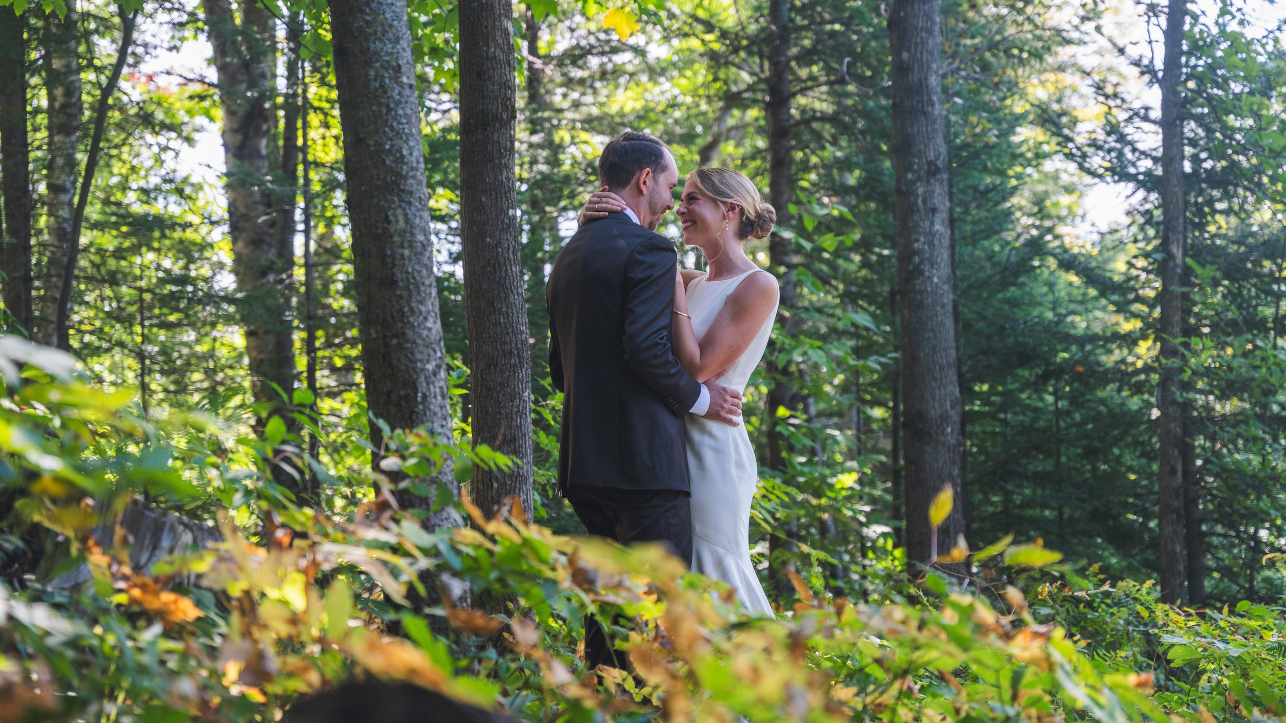 bride and groom share a first dance during the beautiful outdoor wedding