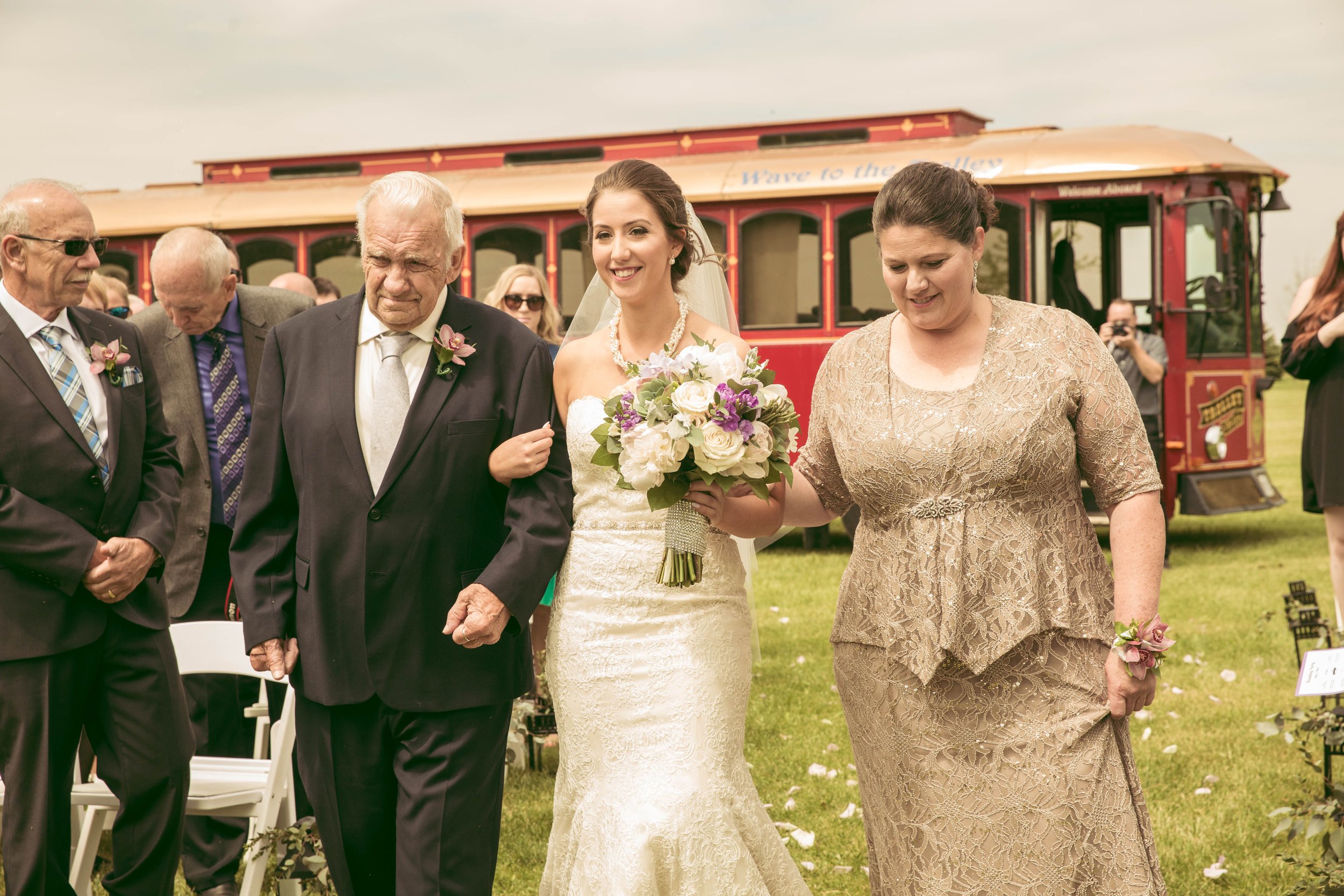 Beautiful outdoor wedding ceremony bride and her family