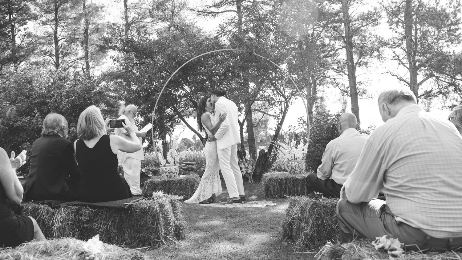bride and groom first kiss in love during the ceremony. beautiful wedding candid moment