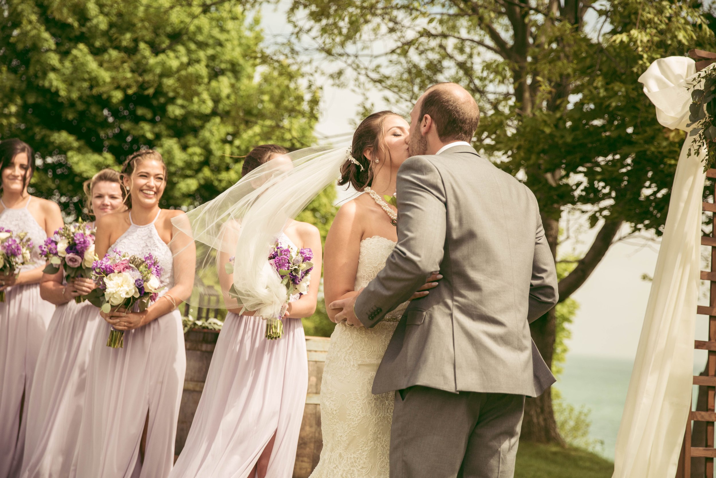 bride and groom at the altar of their beautiful wedding. First kiss