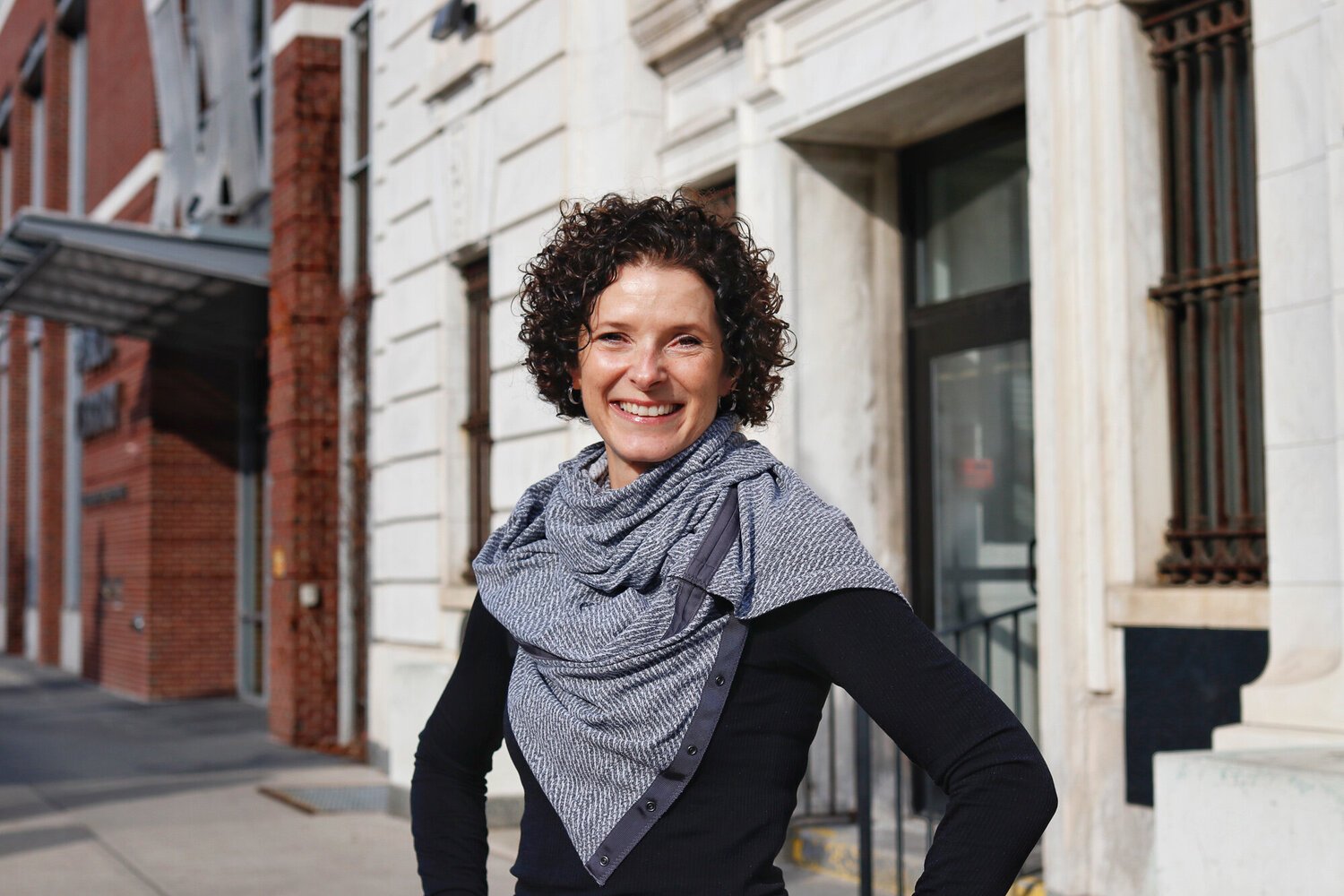 Christy Alexander, owner of WorkSmart, in front of WorkSmart's home in the former First National Bank of Glens Falls.