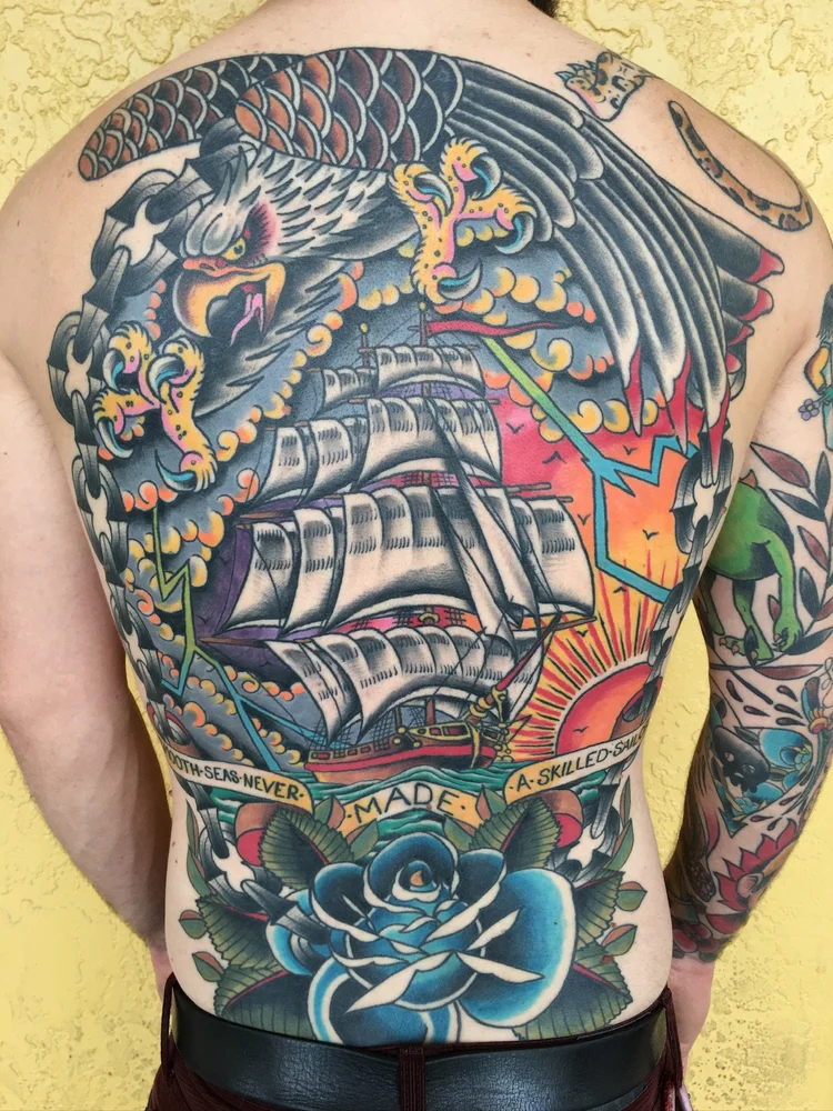 American Traditional back piece of a clipper ship, eagle and blue rose
