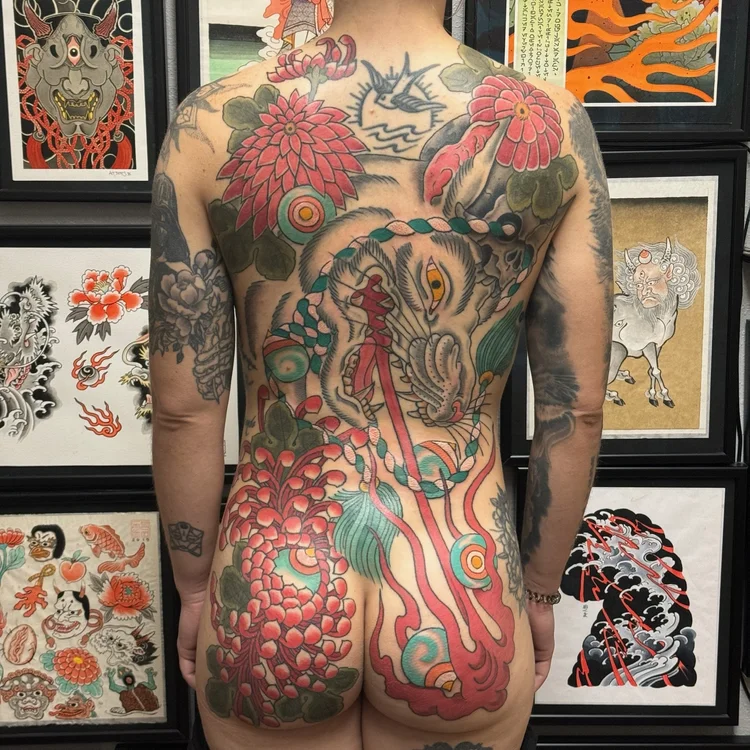 Japanese full back piece tattoo with peonies and flames by Chris Buckholts