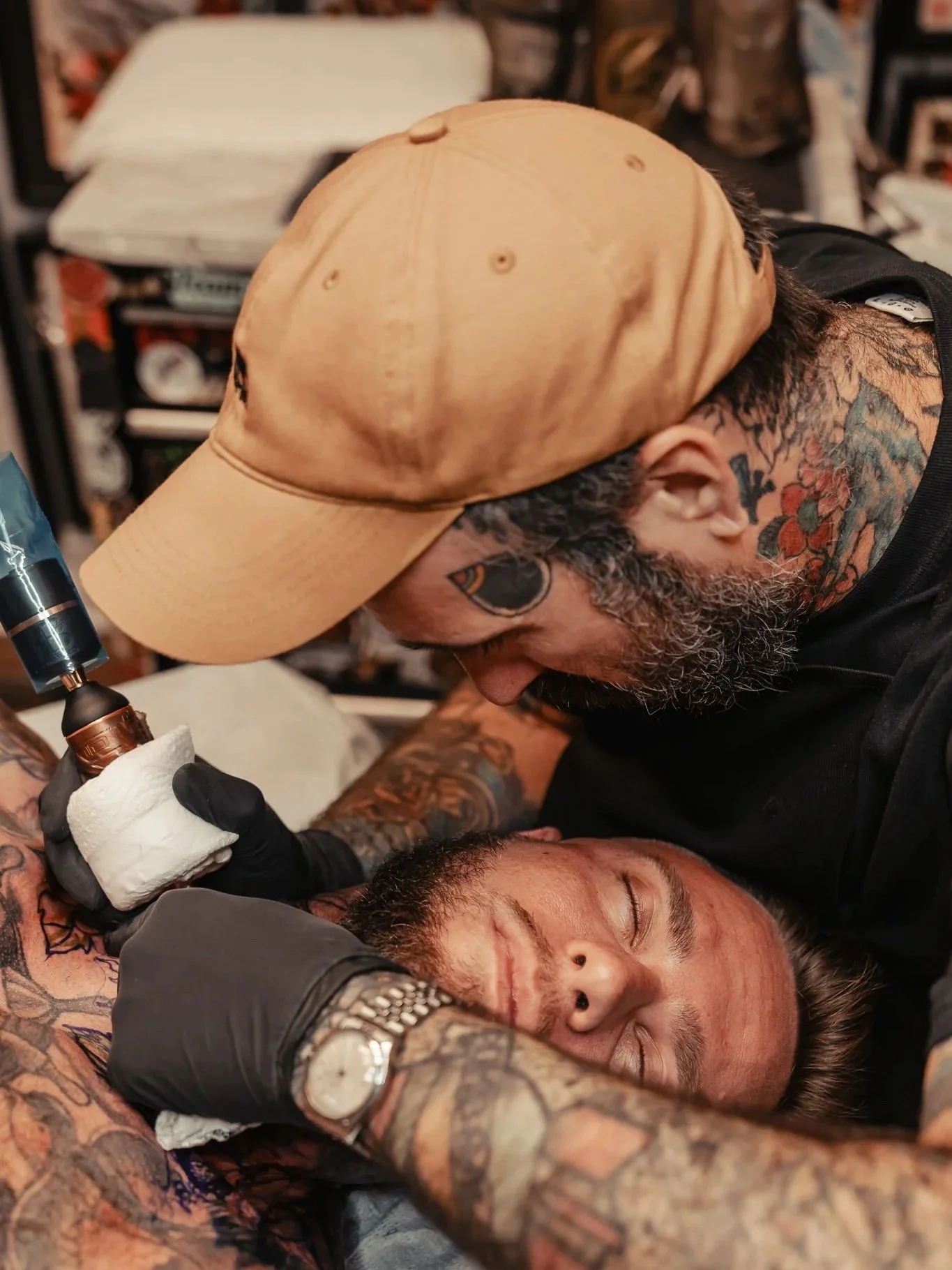 Chris Buckholts tattooing a client at Webbworks Tattoo Studio in Naples, FL