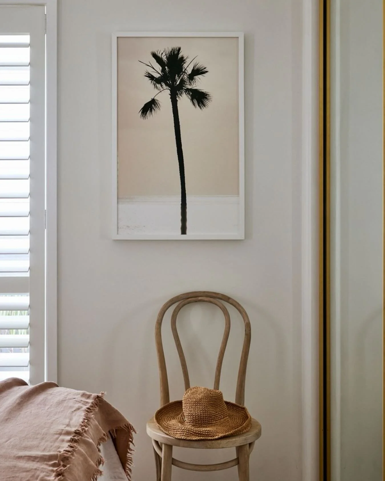 I have been to so many houses with blank walls&hellip;but art should never be something you add at the end of a project.  It&rsquo;s often the element that defines the mood of a room.

In this bedroom, the artwork set the tone for the palette &mdash;