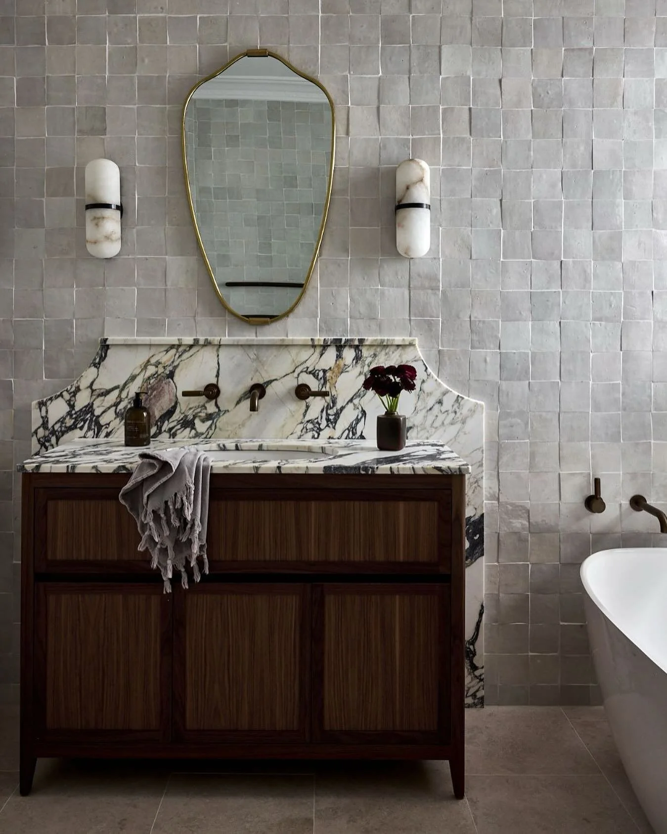 Bathrooms are often treated as purely functional, but they quietly shape the rhythms of daily life.

In the beginning, I hadn&rsquo;t planned to tile the entire walls &mdash; but I&rsquo;m so glad I did, because the result is both practical and beaut
