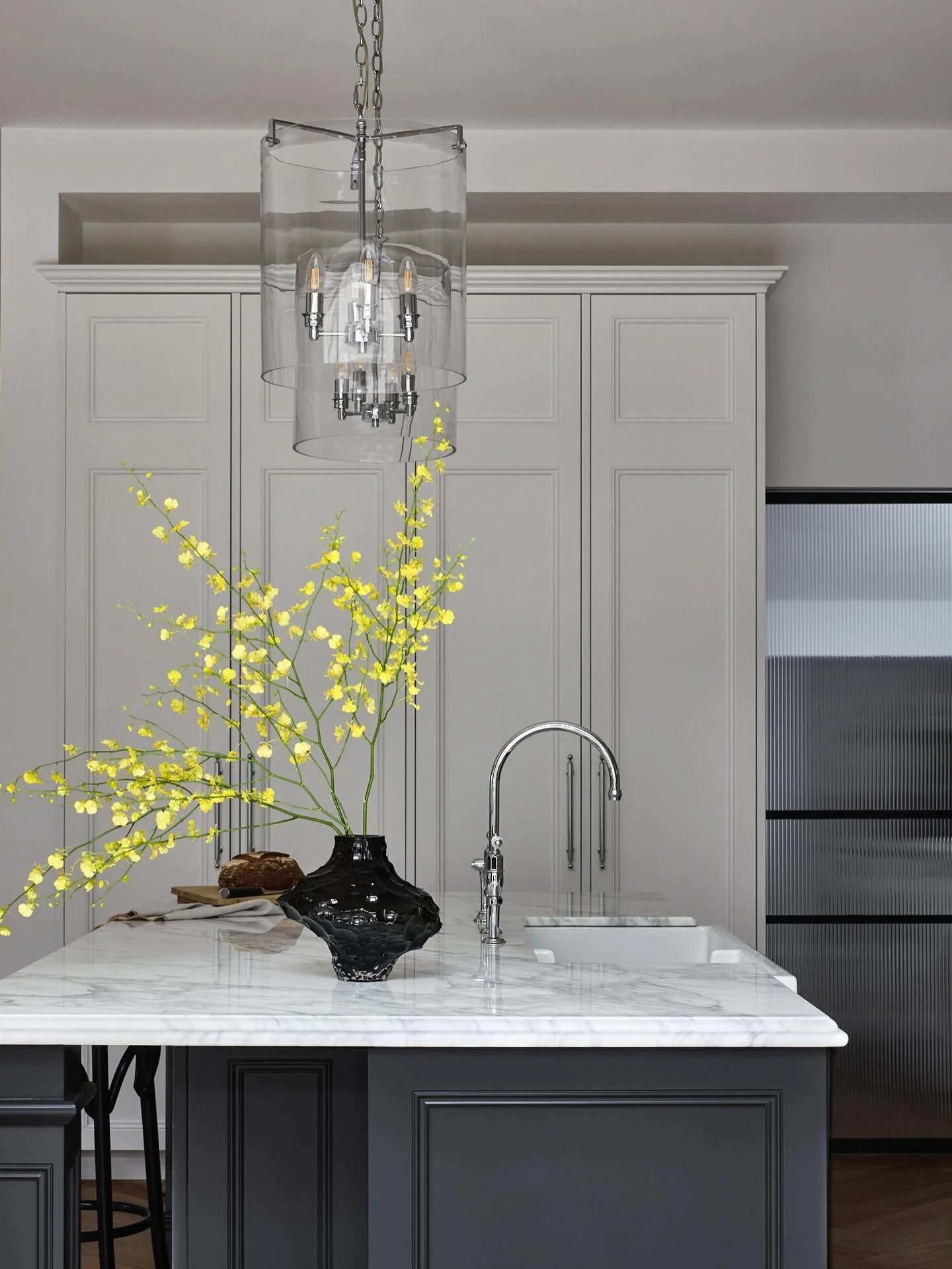 In every home, there&rsquo;s one room that becomes the gravitational pull &mdash; where people end up, linger, return to without thinking.  More often than not, it&rsquo;s the kitchen.

This generous island gets light that moves through the room all 