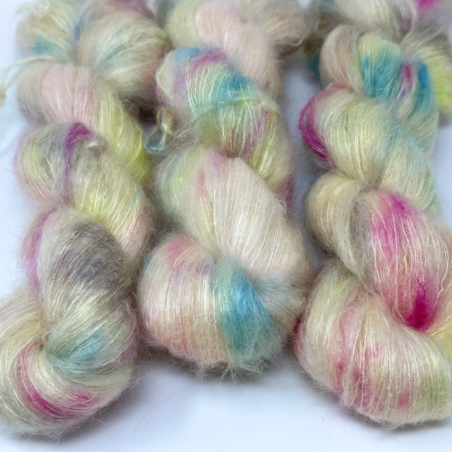 angel fluff yarn is oh so angel oh so fluff at 70% super kid mohair, 30% mulberry silk. hold it alone or with a coordinating heavier yarn for sumptuous luxury soft coziness with the perfect halo! (no pun intended 👼)