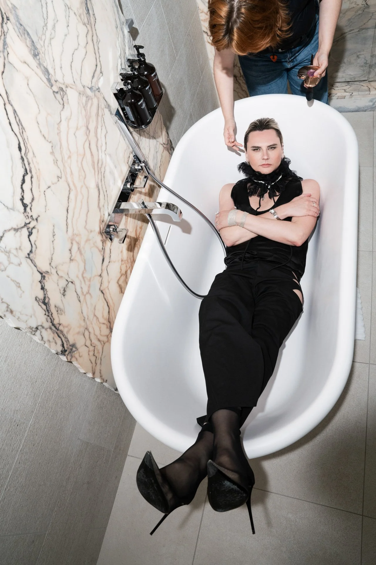 Grey Wiese, Russian-German singer based in Paris, photographed by Yana Laumonier in the bathroom of Manfred Heler's suite at Maison Heler Hotel in Metz, winner of Best Design awards.