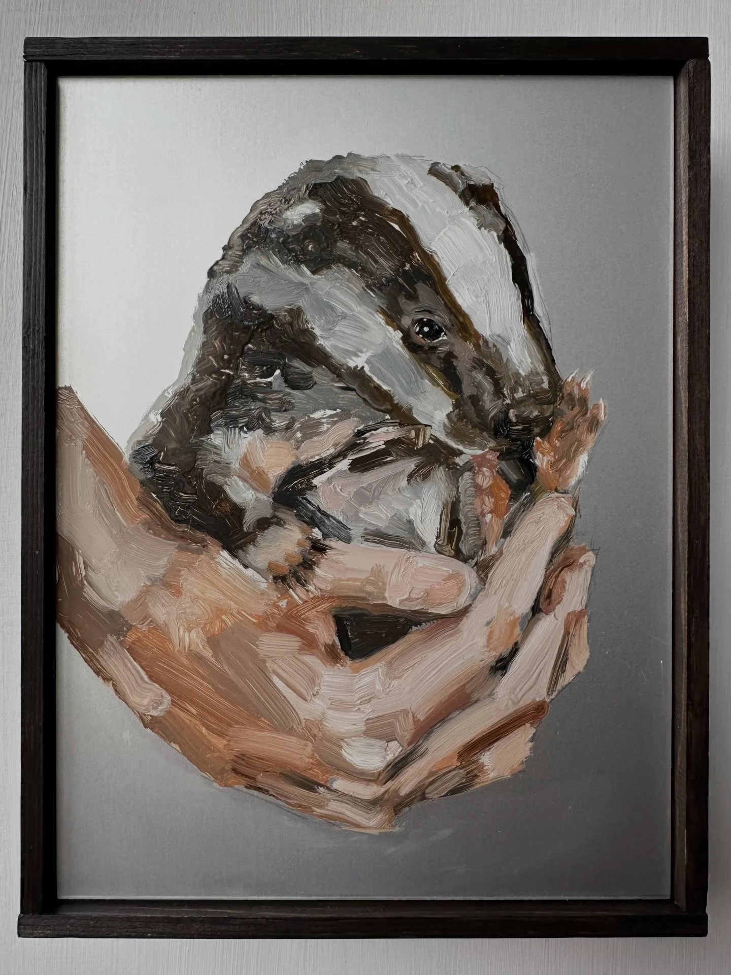 Cub
Oils on aluminium
17x22cm framed in artist&rsquo;s frame
2026

My badger obsession had to start in the same way as my pig obsession, small and handheld.