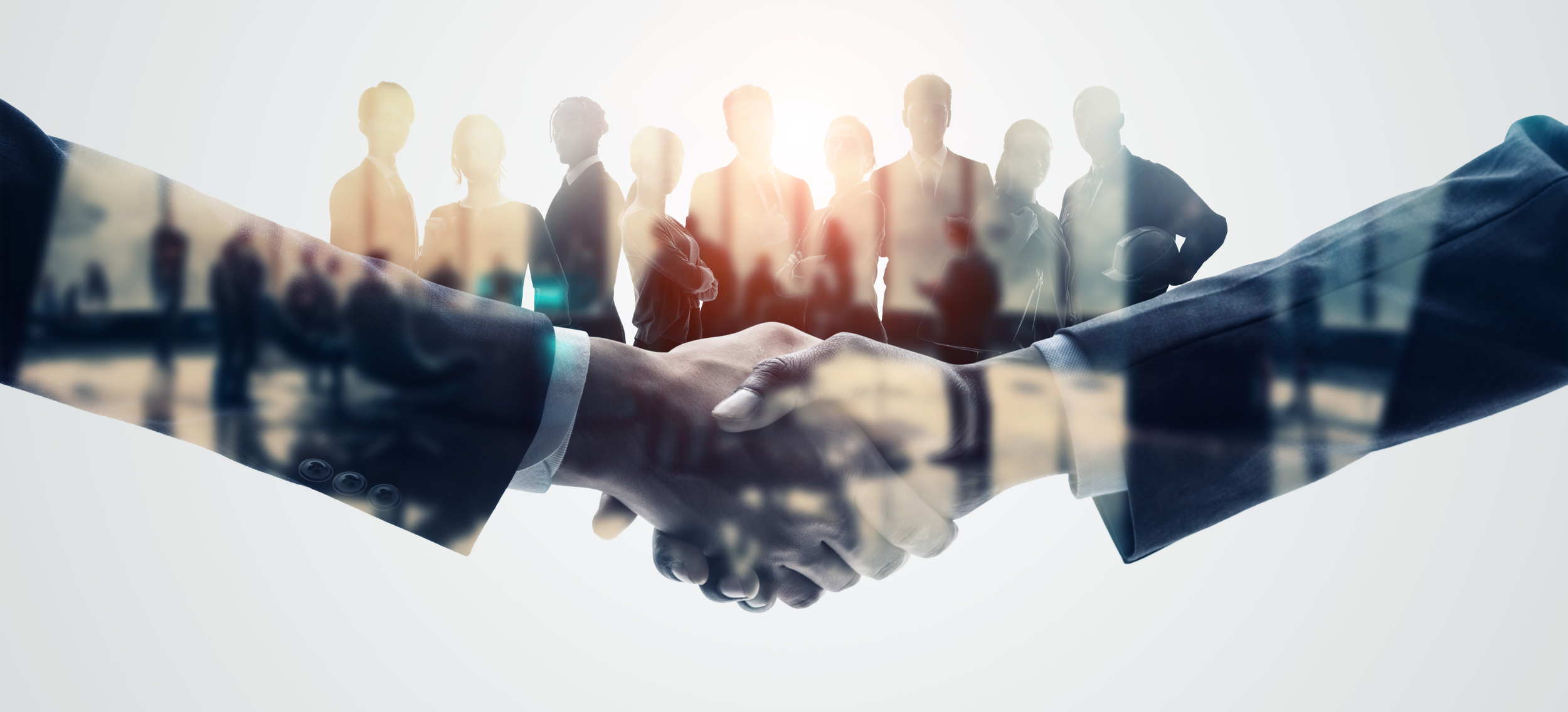 Lawyer shaking hands with satisfied client after free consultation