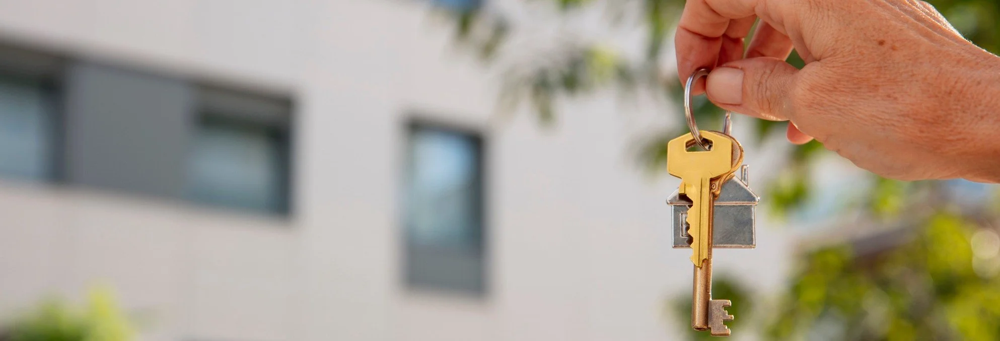 landlord holding a keys for tenancy agreement