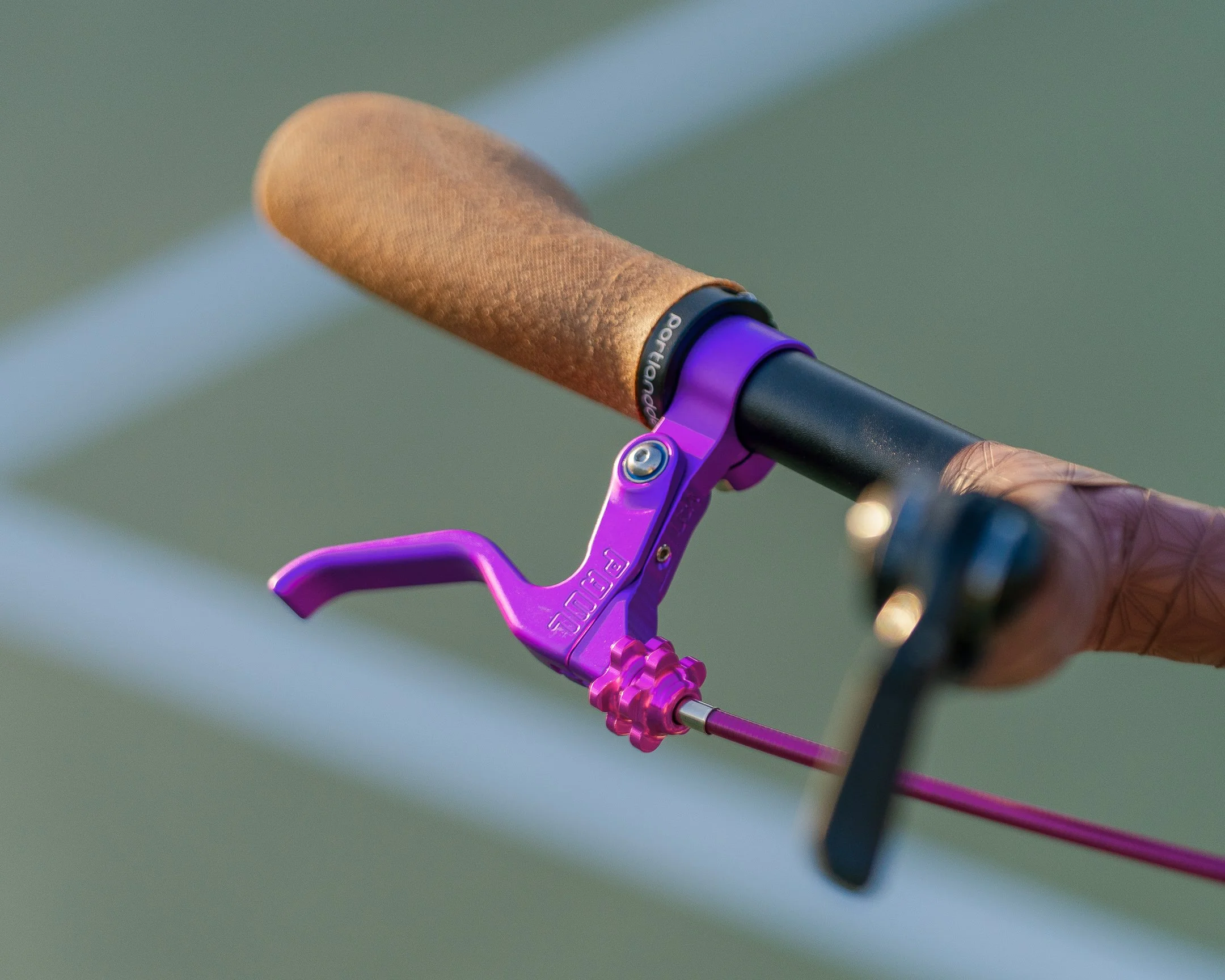 Photograph of a purple brake lever