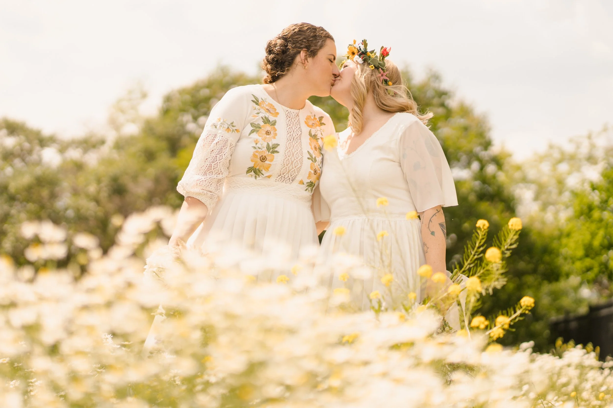 sunshine-kissing-two brides-queer-joy.jpg