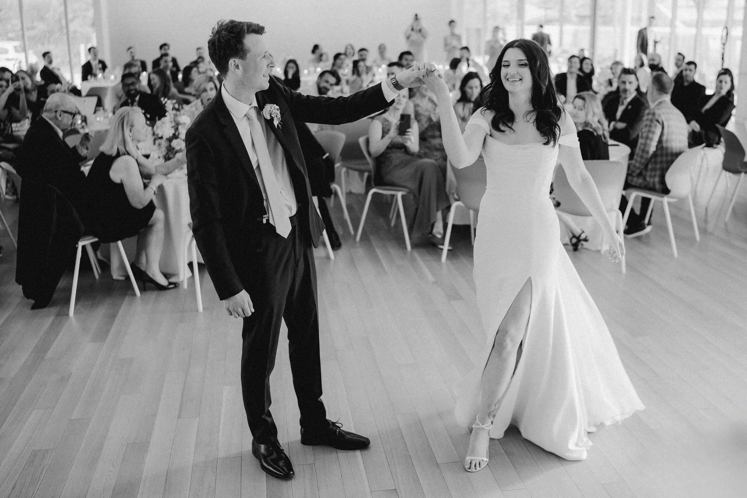 groom-spins-bride-dance-reception-diwan-botanic-gardens-edmonton.jpg