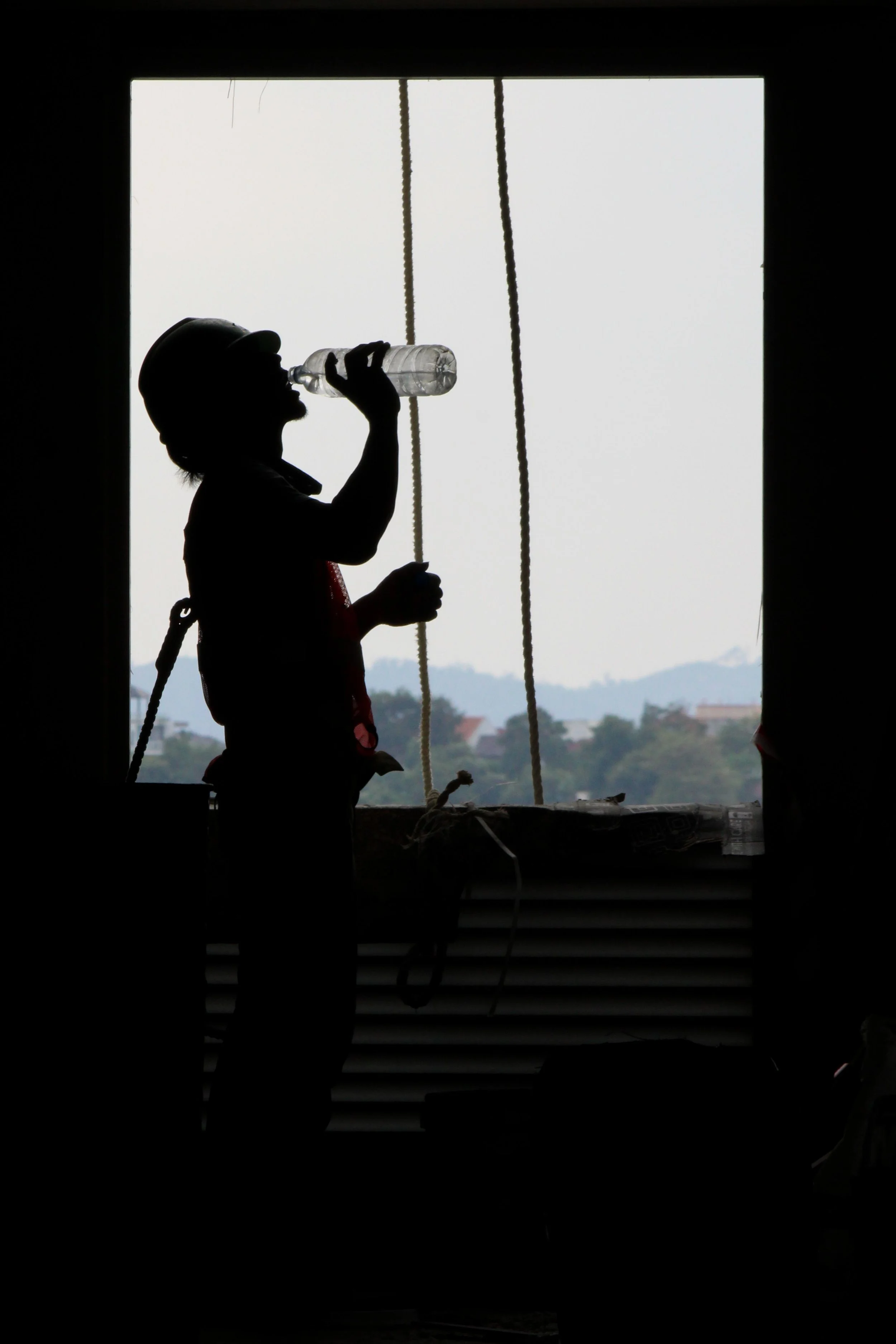a worker drinking water