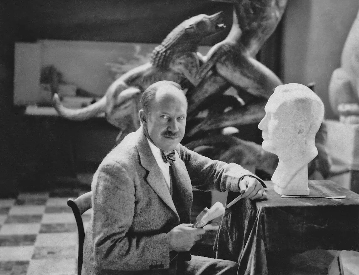 Paul Manship in his Paris studio with bust of FDR © James Abbe Archive