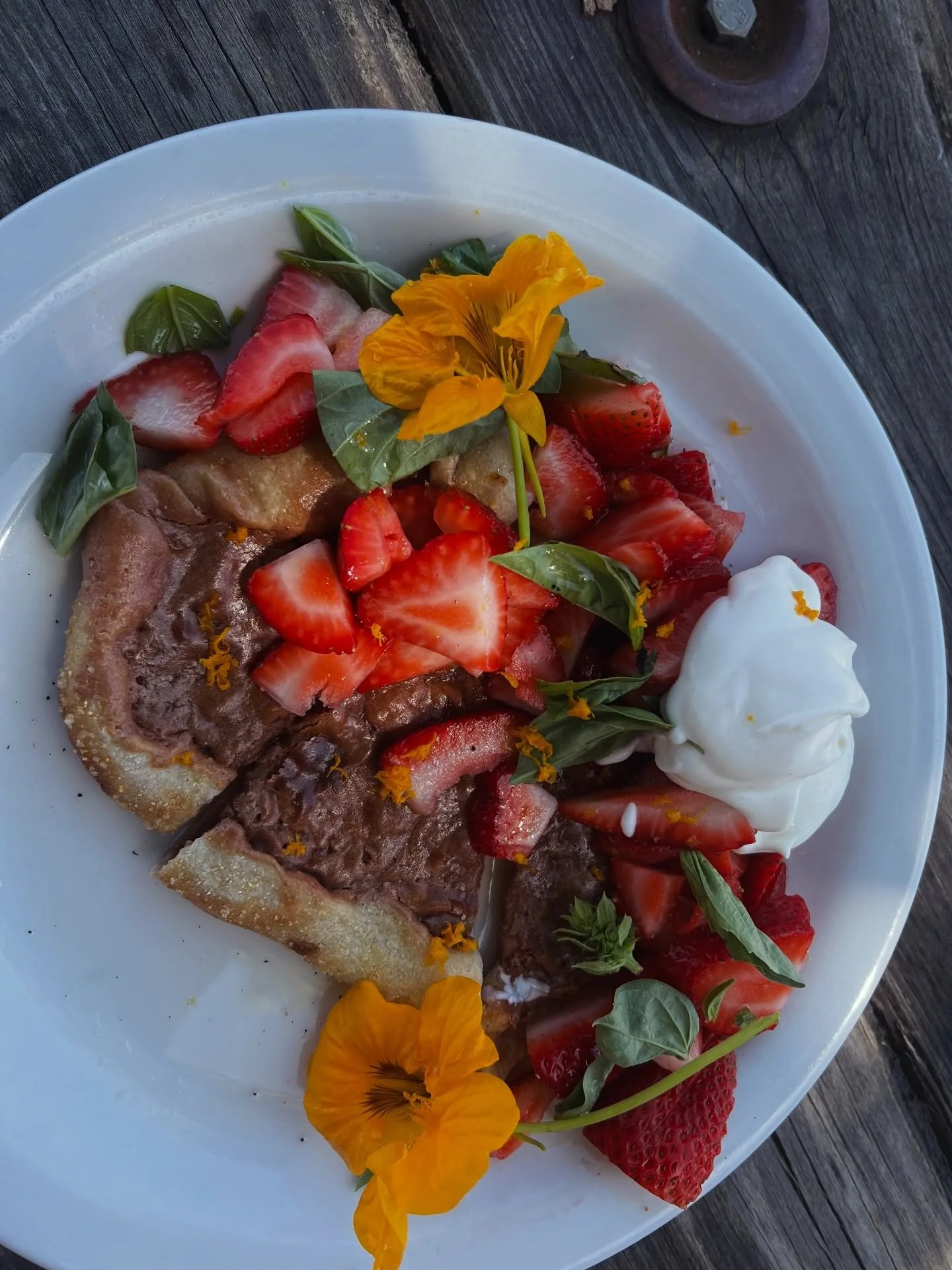 DESSERT PIZZA!
CHOCOLATE-AMARETTO CHEESECAKE BASE,  @route1farmersmarket STRAWBERRIES 
&amp; CREAM, BASIL, MEYER LEMON