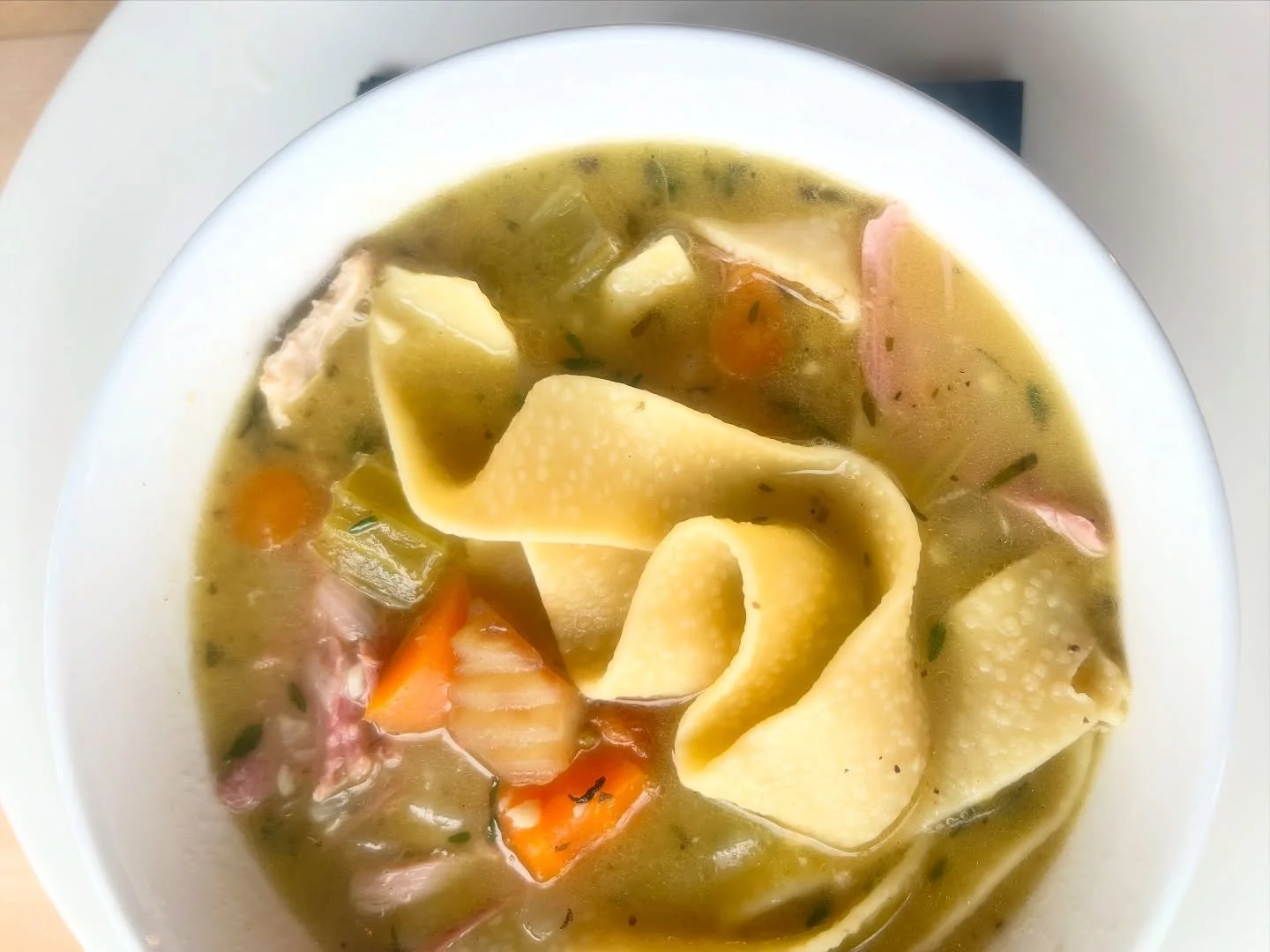 It&rsquo;s not your mom&rsquo;s turkey noodle soup. But it&rsquo;s pretty damn good! Smoked turkey leg meat, pappardelle noodles, parmesan infused turkey broth.