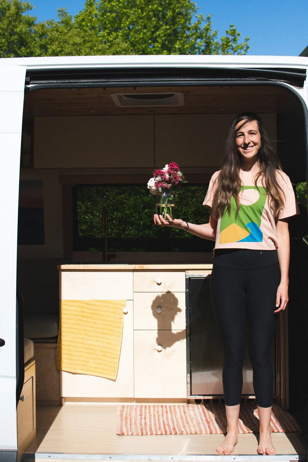 Chloe with gifted bouquet at Manzanita Ave, Marin (Chloe, May 2021).