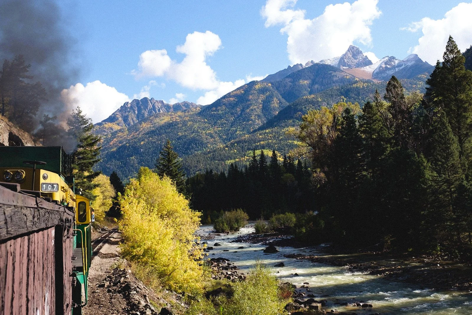 Riding the Durango to Silverton Narrow Gauge Railway along the Upper Animas with Pigeon Peak in the background (October 2021).