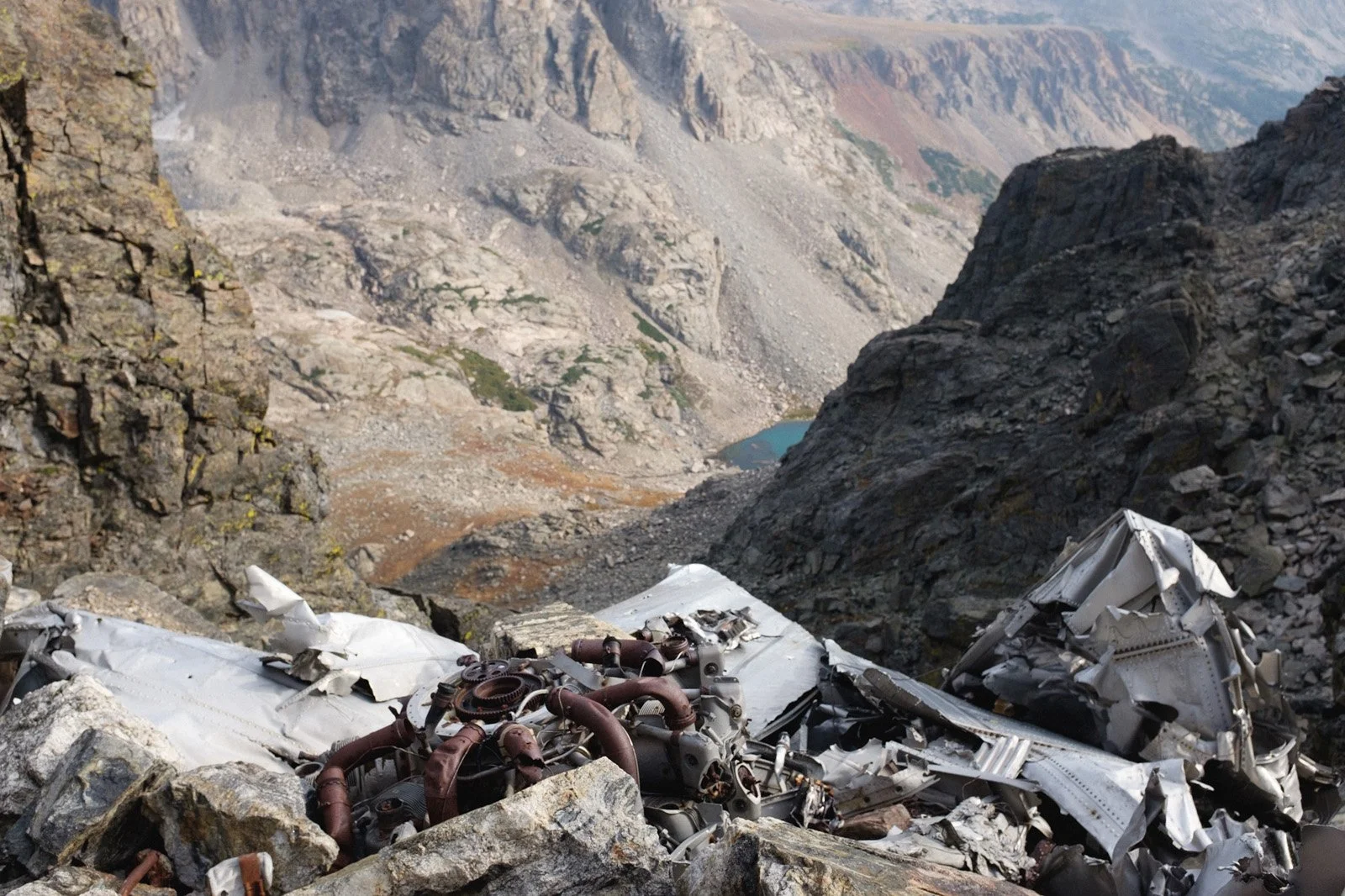 Up the steep and loose "Airplane Gully," hiking past an airplane crash from 1948. The World War II era plane crashed into the mountain and exploded, sending bits and pieces of the plane up and down the slope of the gully. The propeller, motor, fusela