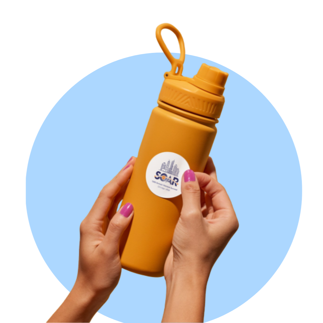 Person holding a yellow water bottle with a city skyline logo and the word 'SOLAR' on it, against a light blue background.