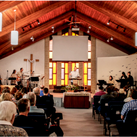 Church Gathering with stained glass