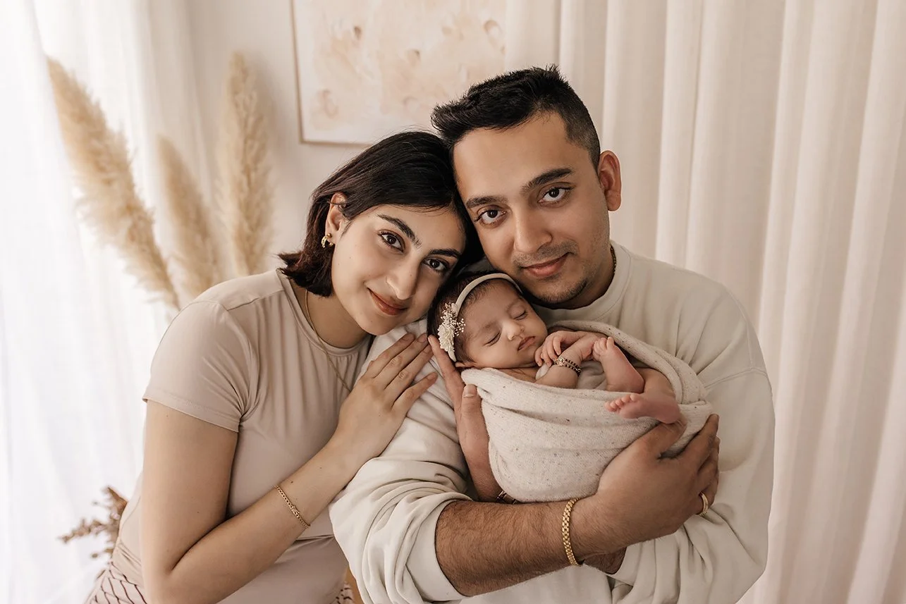 Family portrait with newborn baby in Melbourne based photography studio