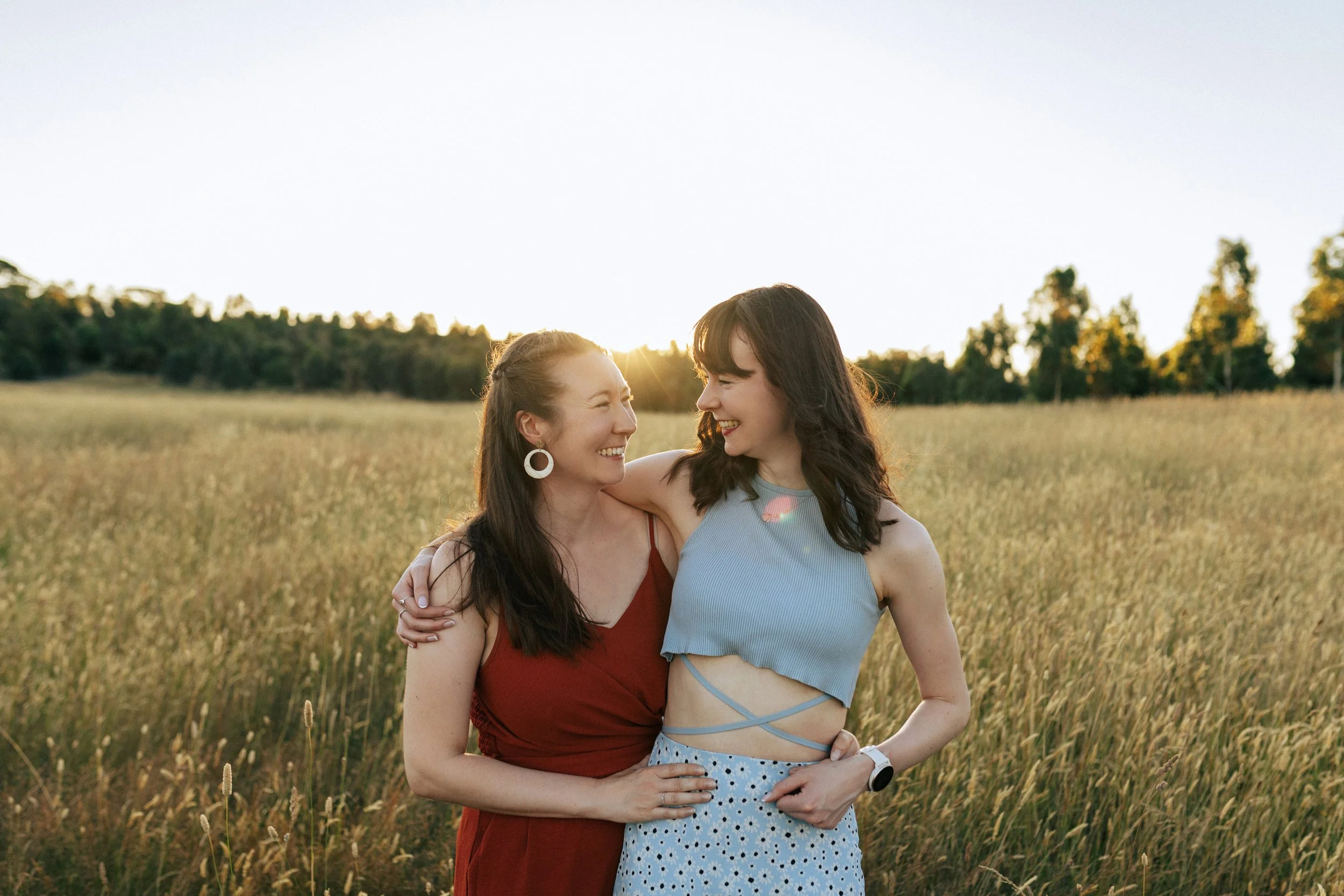 Sisters smiling at each other