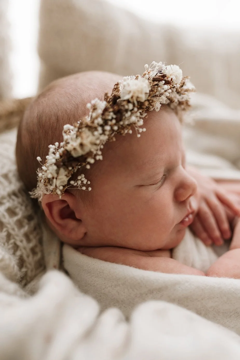 Close-up portrait of a sleeping newborn baby.