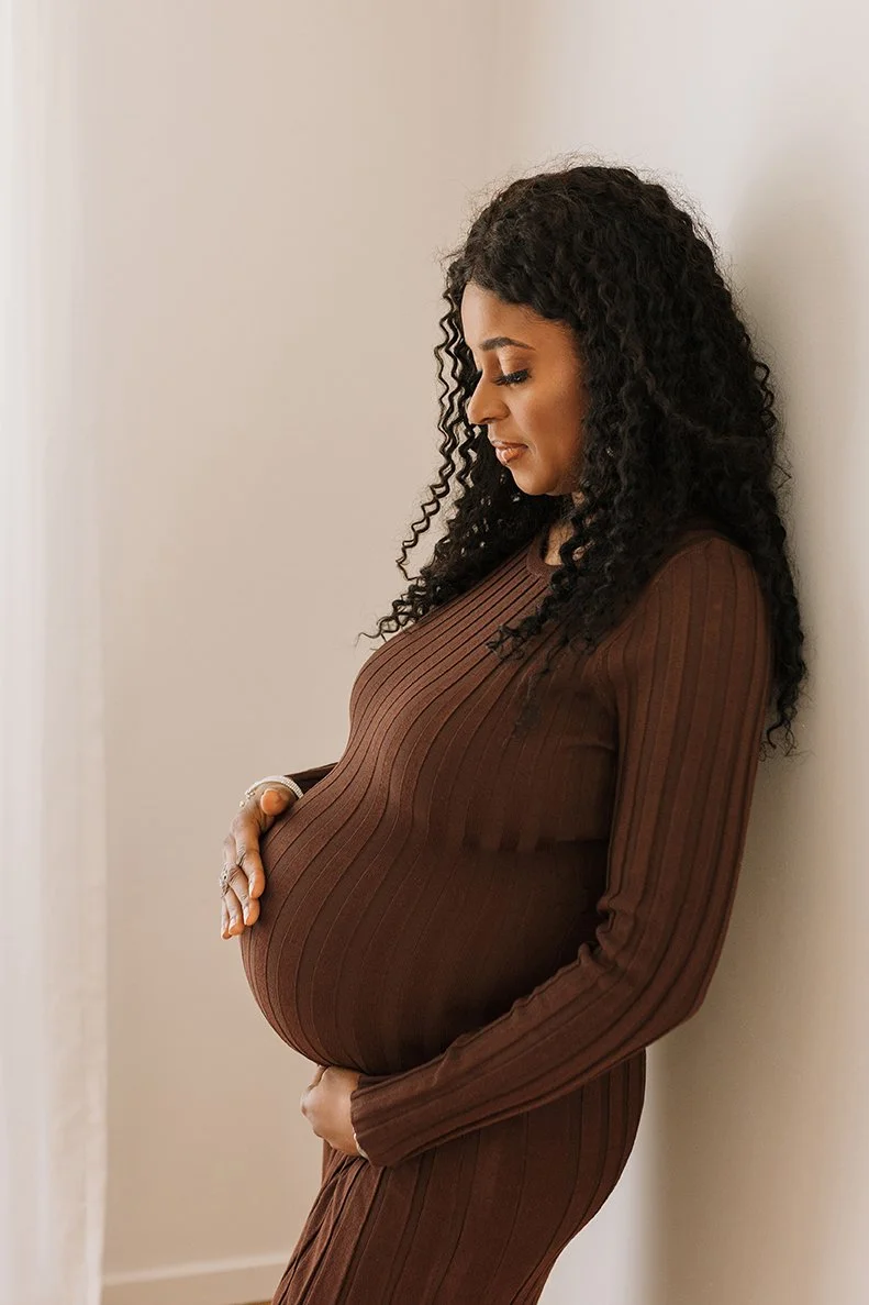 Elegant maternity portrait captured in a Melbourne photography studio.
