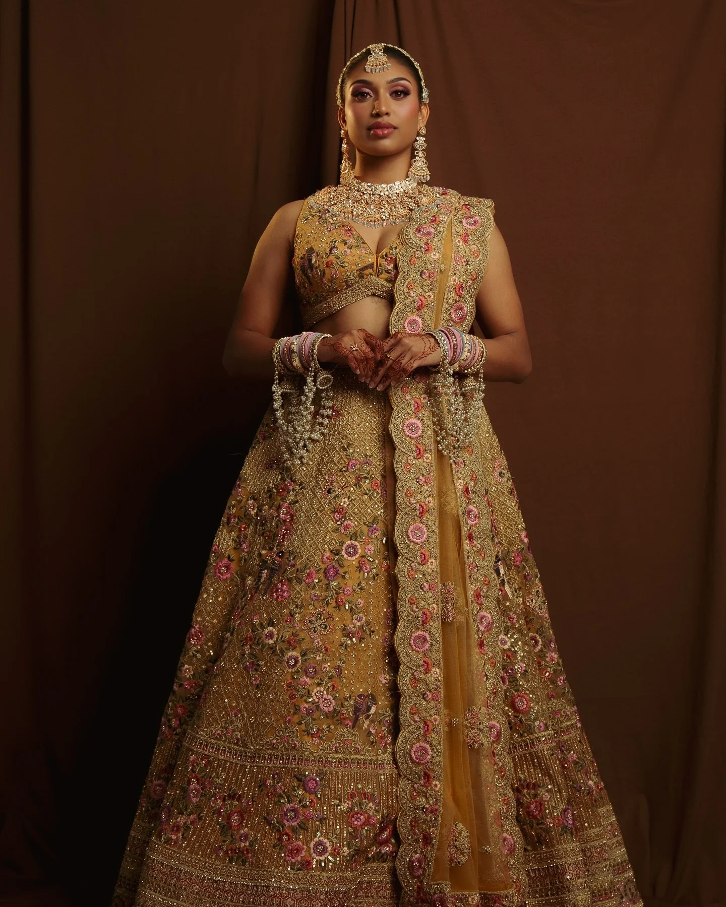 Golden Hues, timeless elegance ✨

Model: @haranee.logaan 

Bridal Makeup, Hair Styling, and Full Bridal Dressing by me
Henna: @swirledhenna 
Outfits: @abhishekh_n_radhika_gupta 
Jewerelly: @sparklingcreations15 
Flowers: @flowerimbymaziah 

Photograp