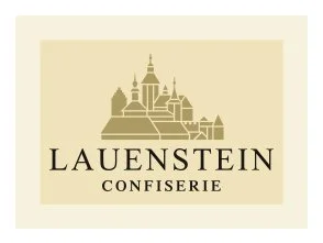 Logo mit stilisierter Burg und Text 'Lauenstein Confiserie'