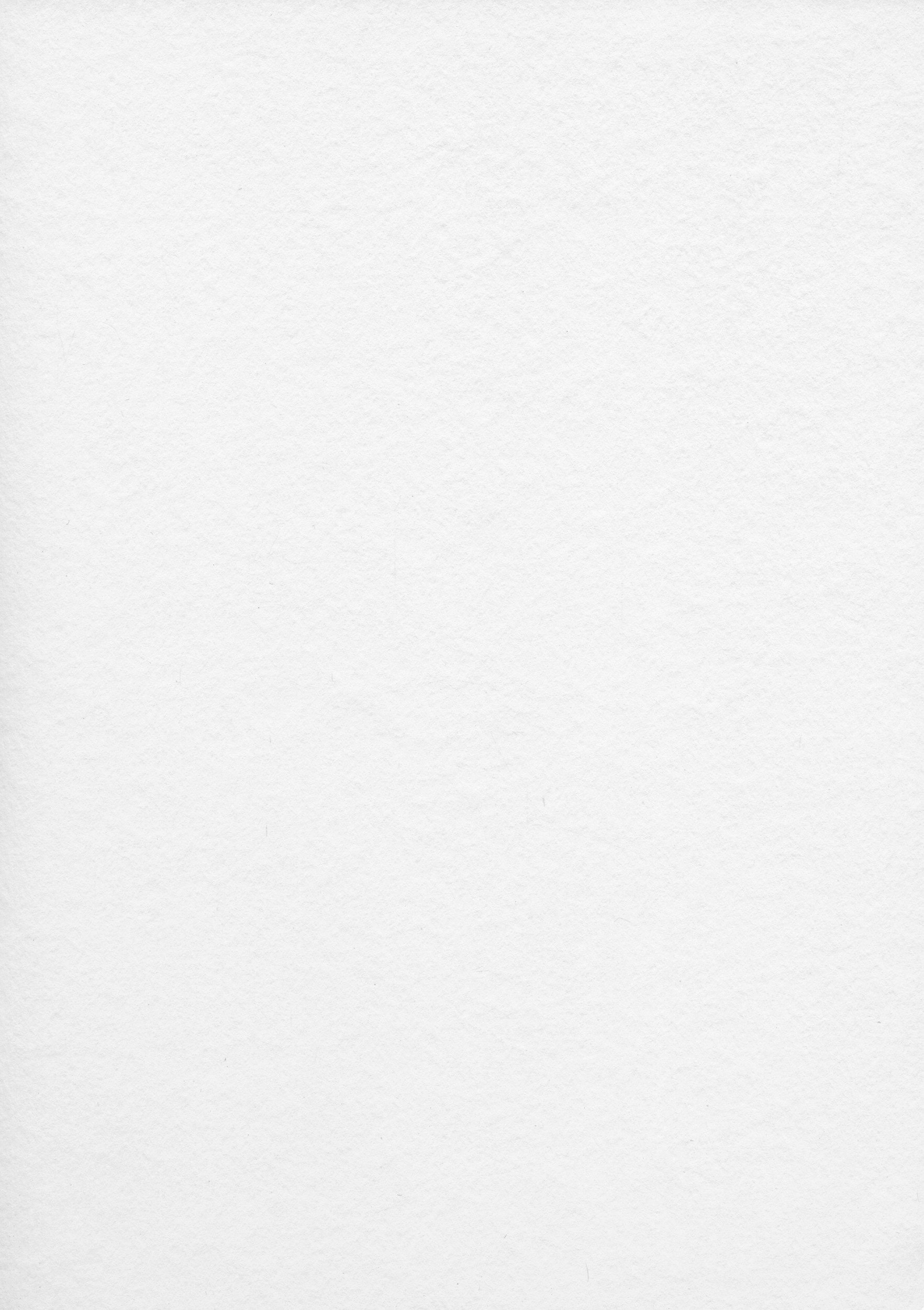 A landscape featuring distant mountains with a cloudy sky, a body of water in the foreground, and a few small trees and a building with vertical wood siding in the lower right corner.