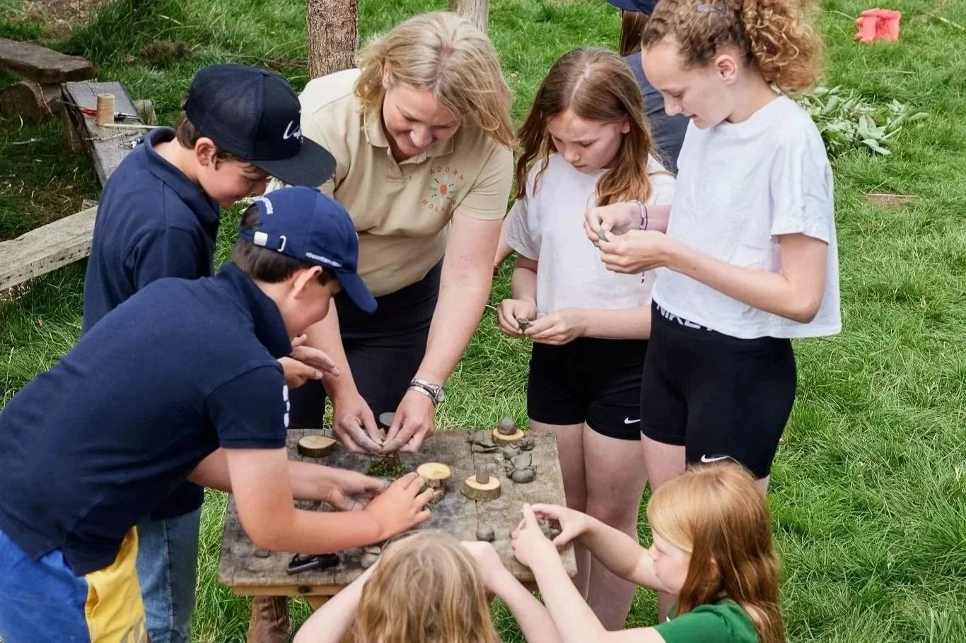 children gathered around a table