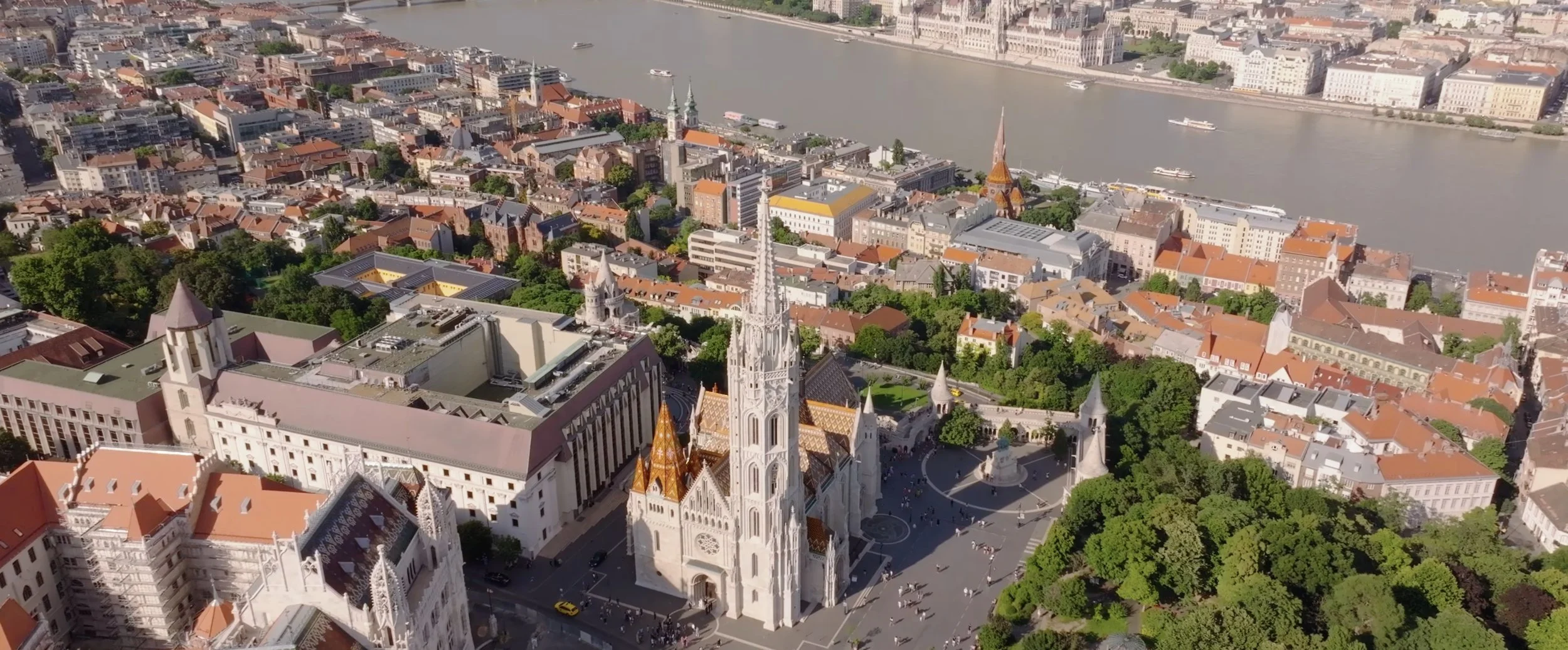 Aerial view of Matthias Church and the Fisherman's Bastion in Budapest from a wedding film by Closer Wedding Studio