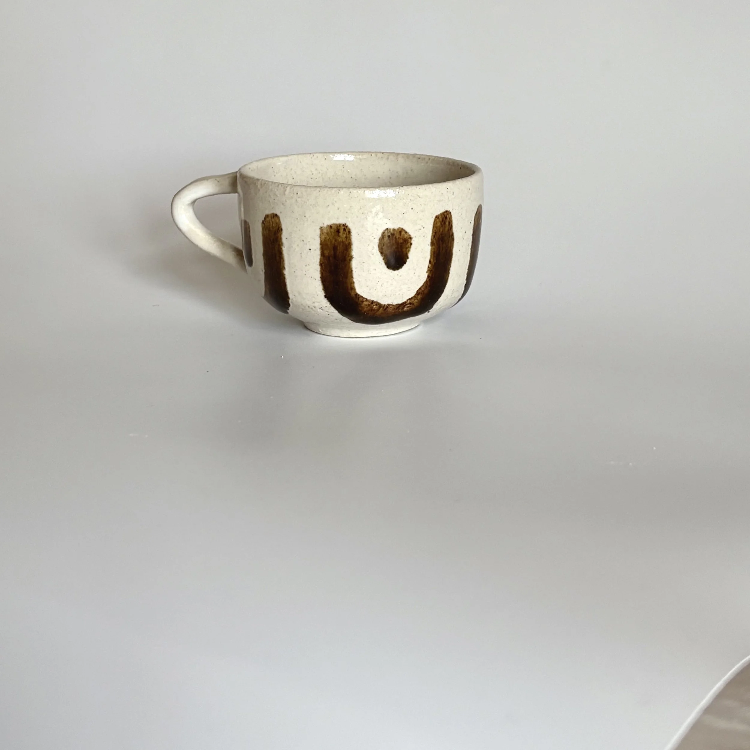 frank coffee cup far.jpg