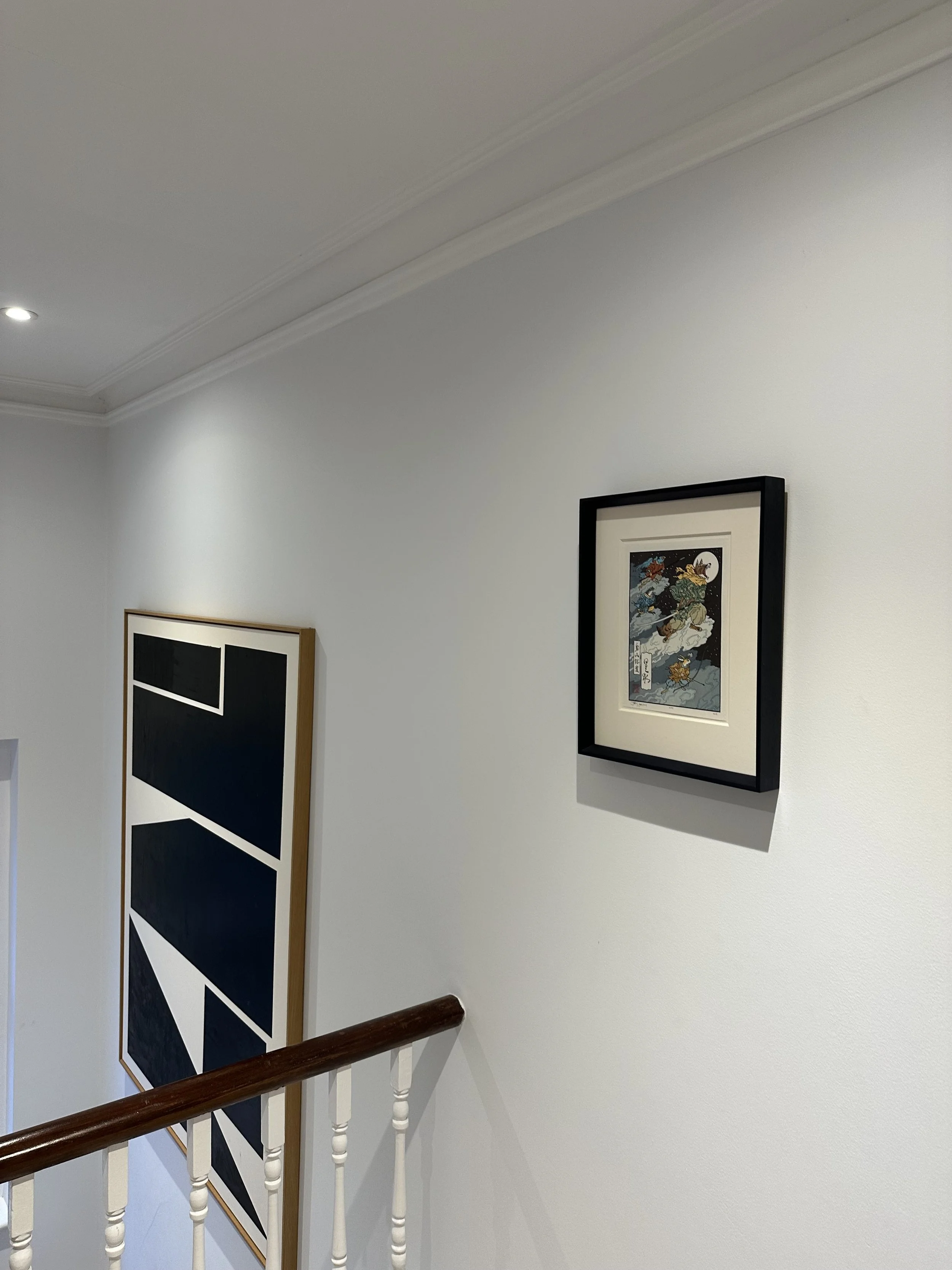 Why Choosing Professional Picture Hangers Over a Handyman Matters in London