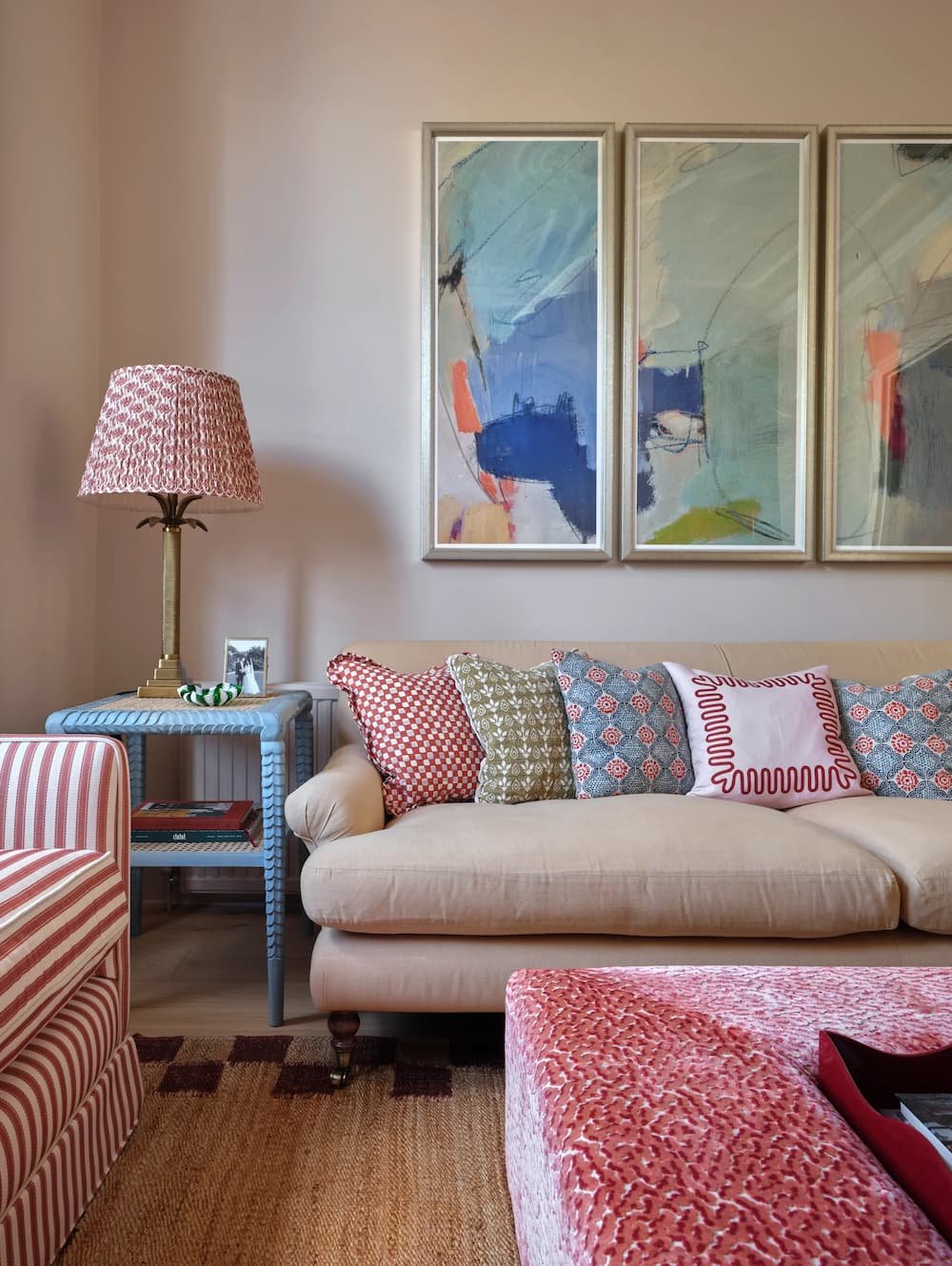 Professional picture hanging by Gilbert Art Services in a luxury Holland Park townhouse designed by Alice Crawley Interiors, featuring perfectly levelled contemporary art.