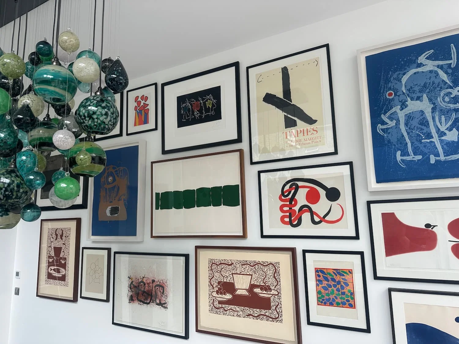 Gallery wall installation by our team in a Highbury and Islington town house