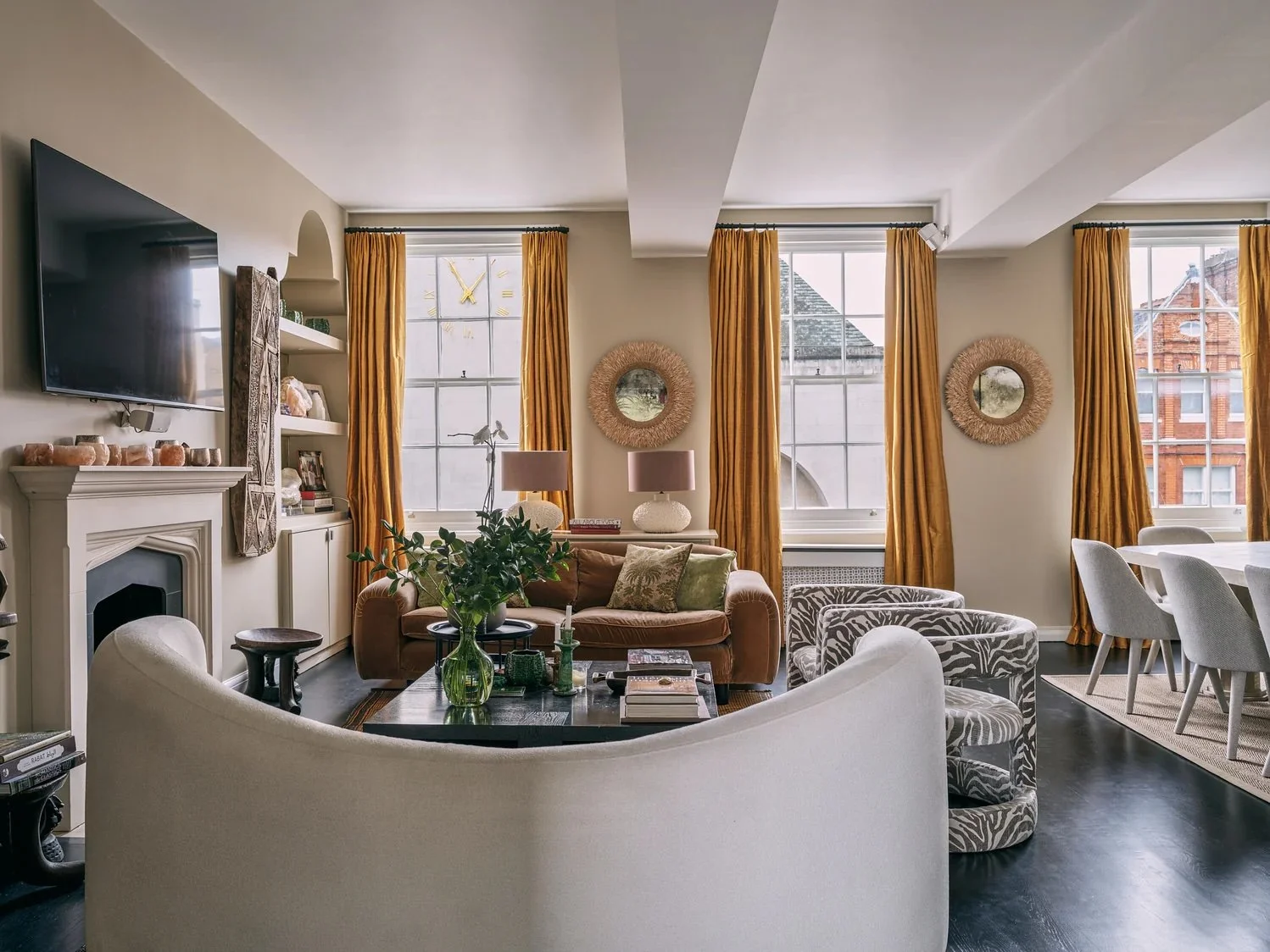 mirror and wall sculptures installed in the living room of a luxury Chelsea apartment