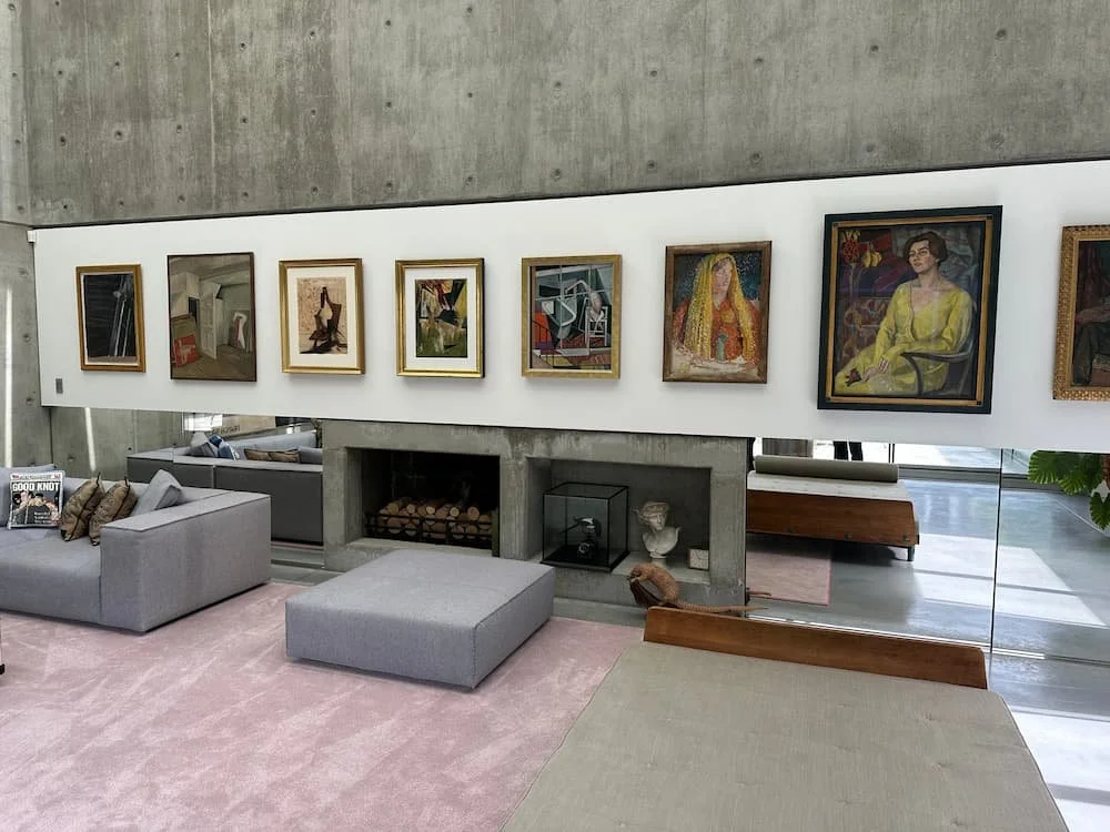 gallery wall artwork installation in modern home