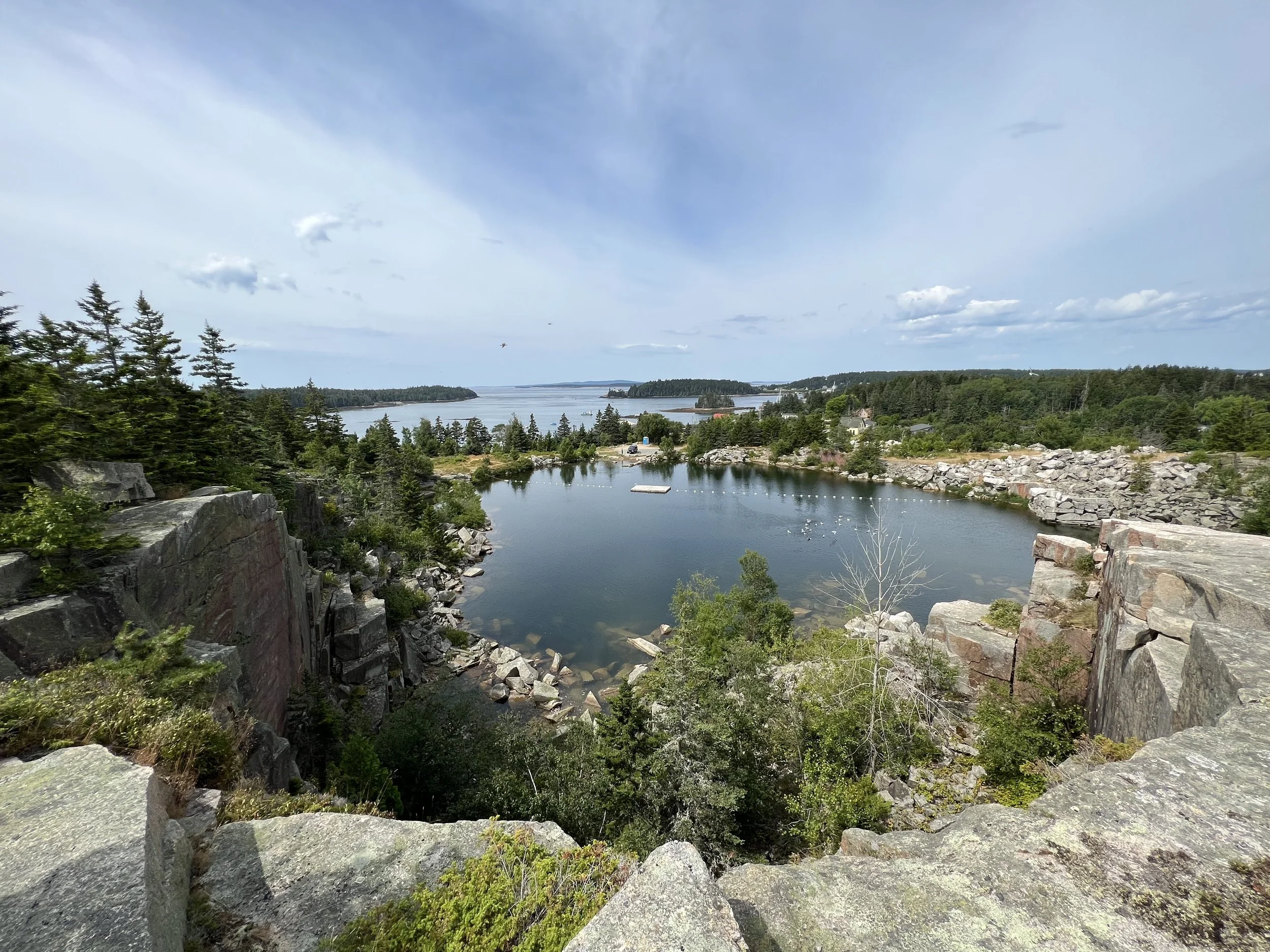 View of old quarry pond adjacent to site, now a public swimming pond. 