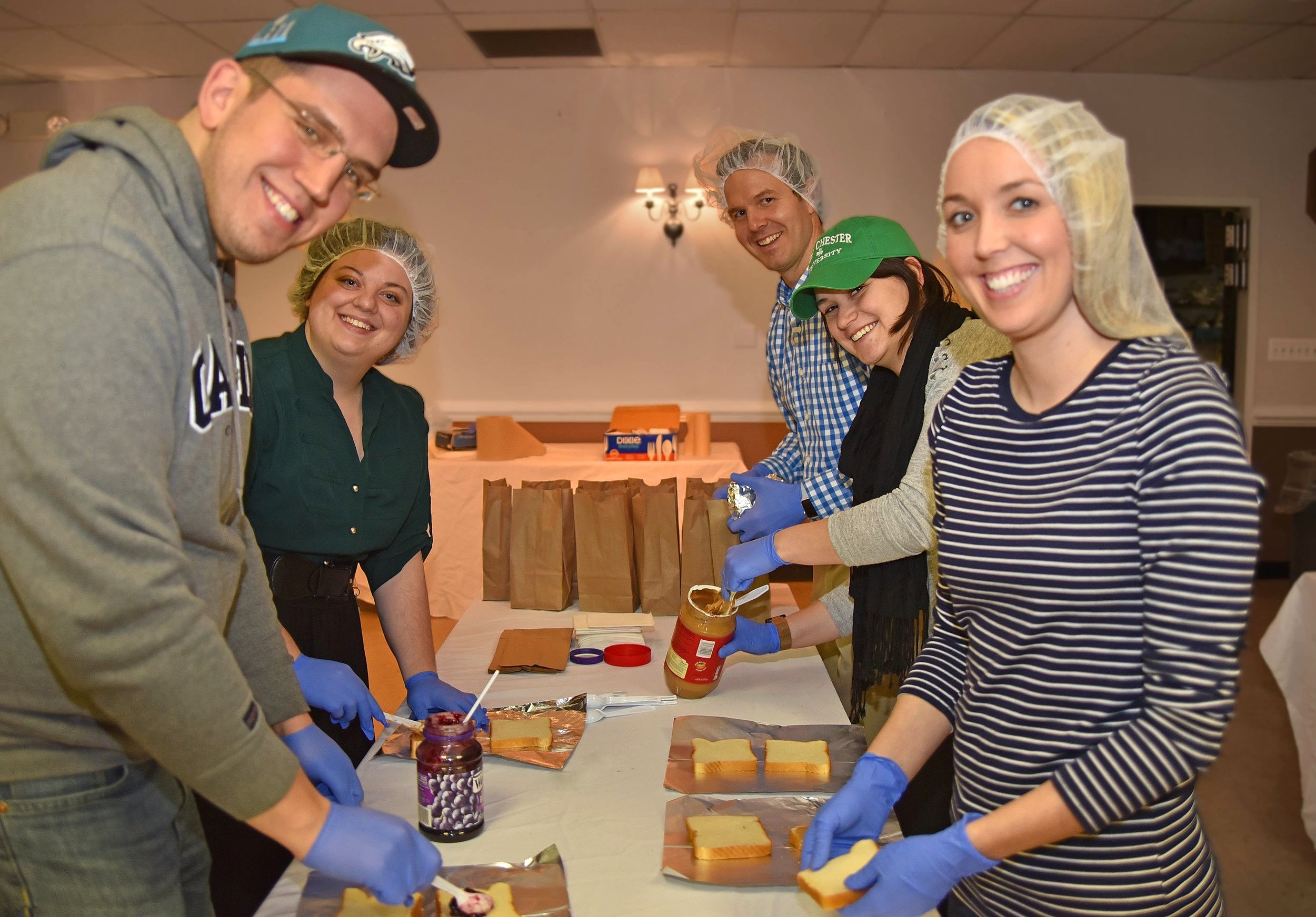 West Chester Rotary preparing peanut butter and jelly sandwiches for local homeless shelter