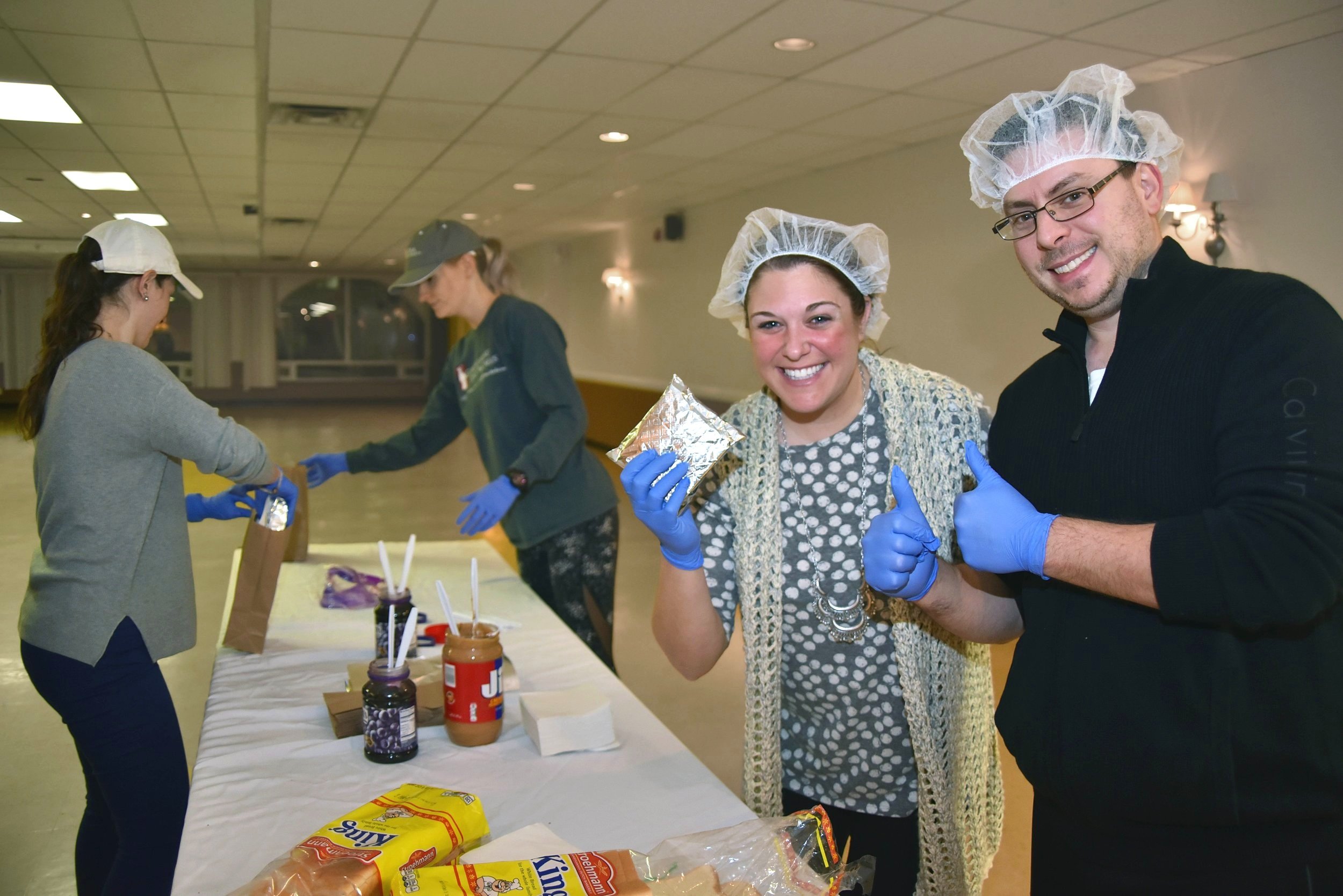 West Chester Rotary preparing peanut butter and jelly sandwiches for local homeless shelter