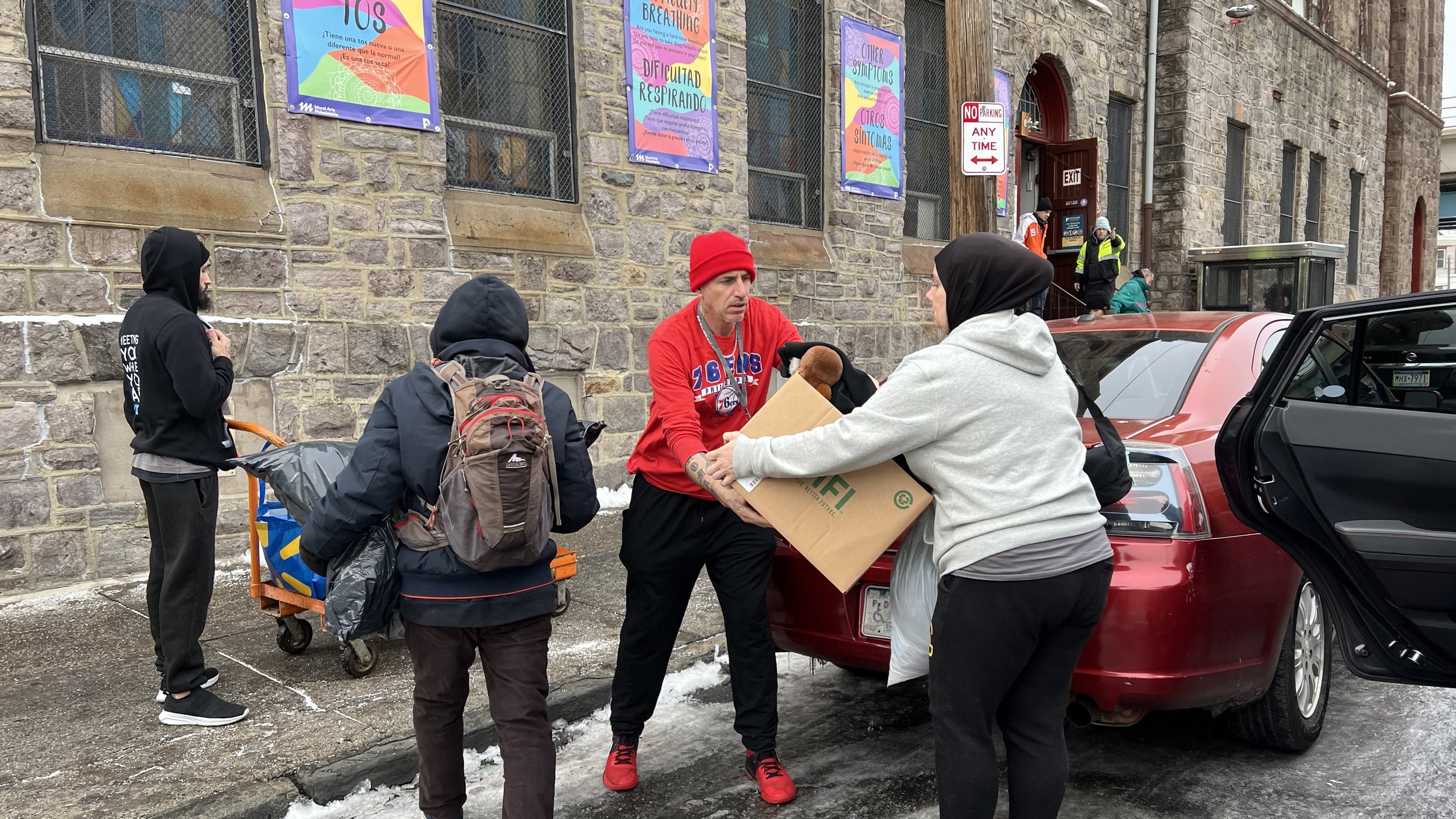 Chestnut Hill Rotary volunteers delivering food and clothing donations to Prevention Point Philadelphia