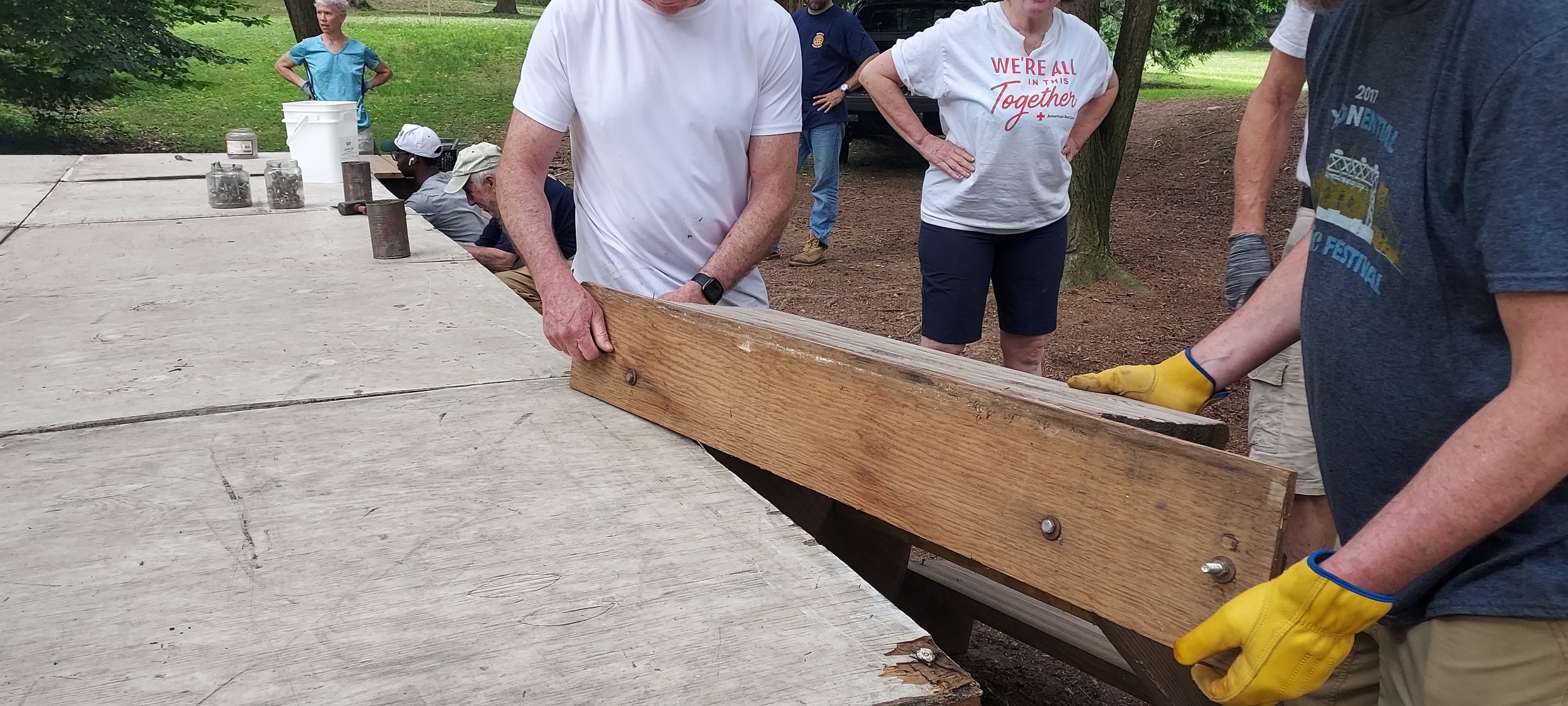 Volunteers from Chestnut Hill Rotary finishing the assembly of the stage for summer concerts for the local community.