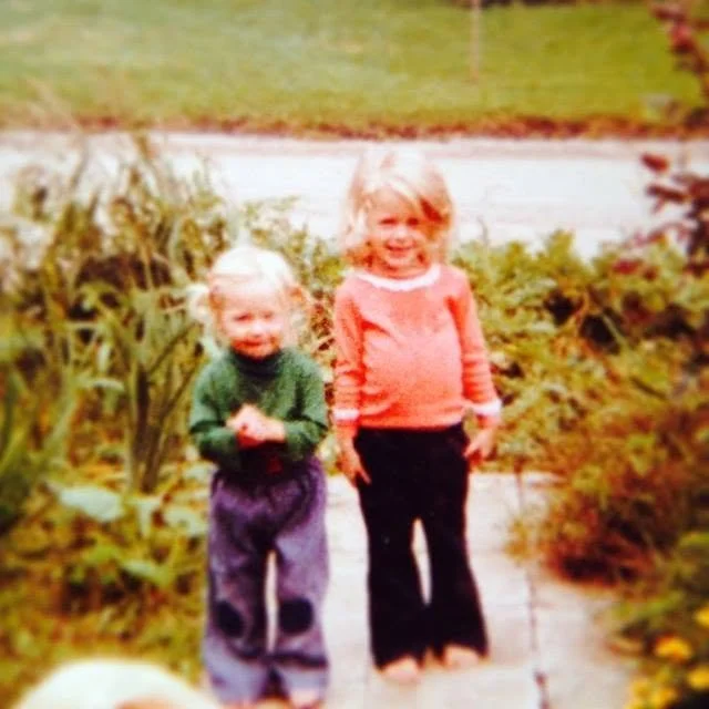 Jessica and her younger sister as kids in their favorite home garden playground